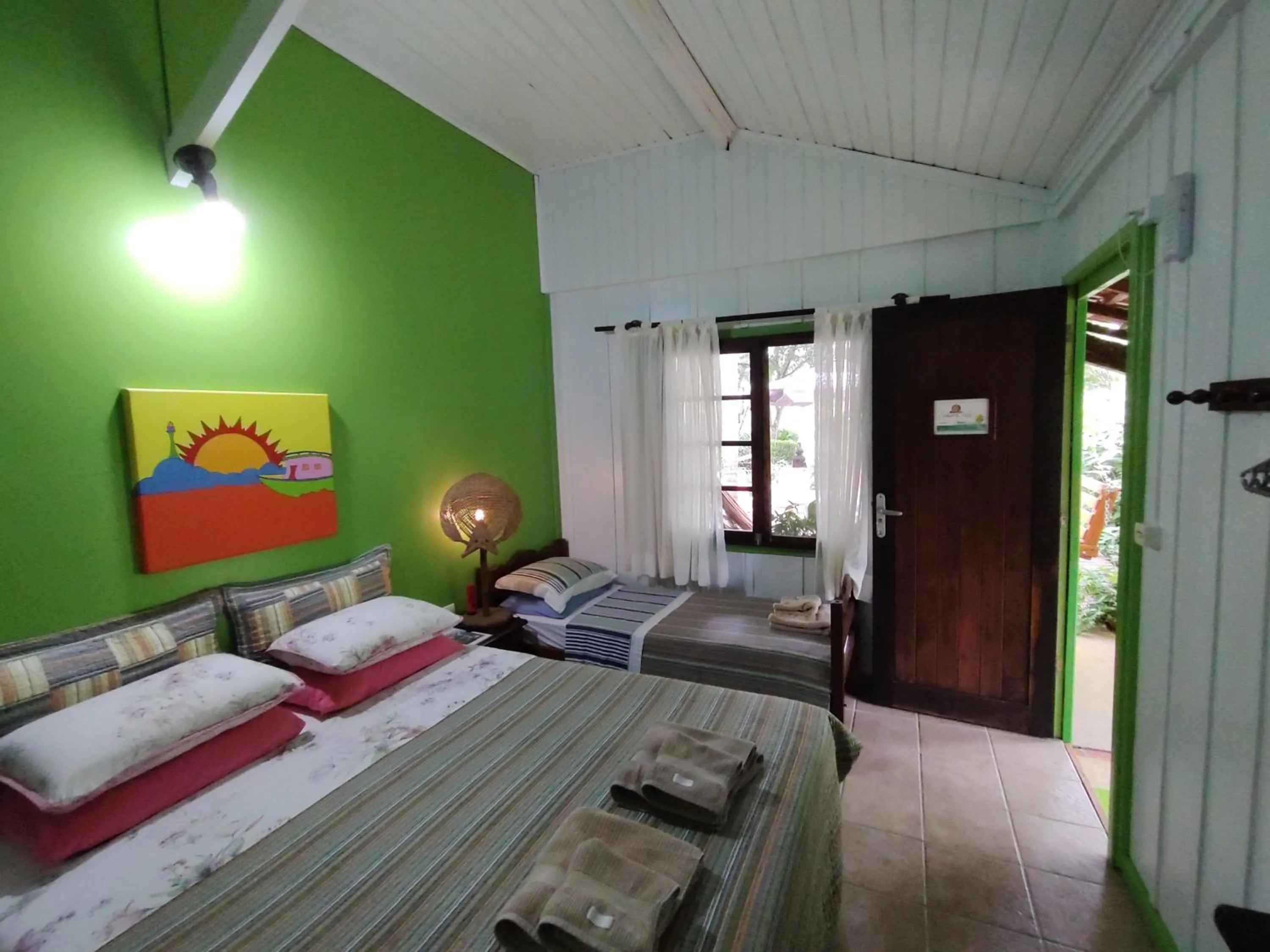 Bed in Pousada Enseada das Conchas