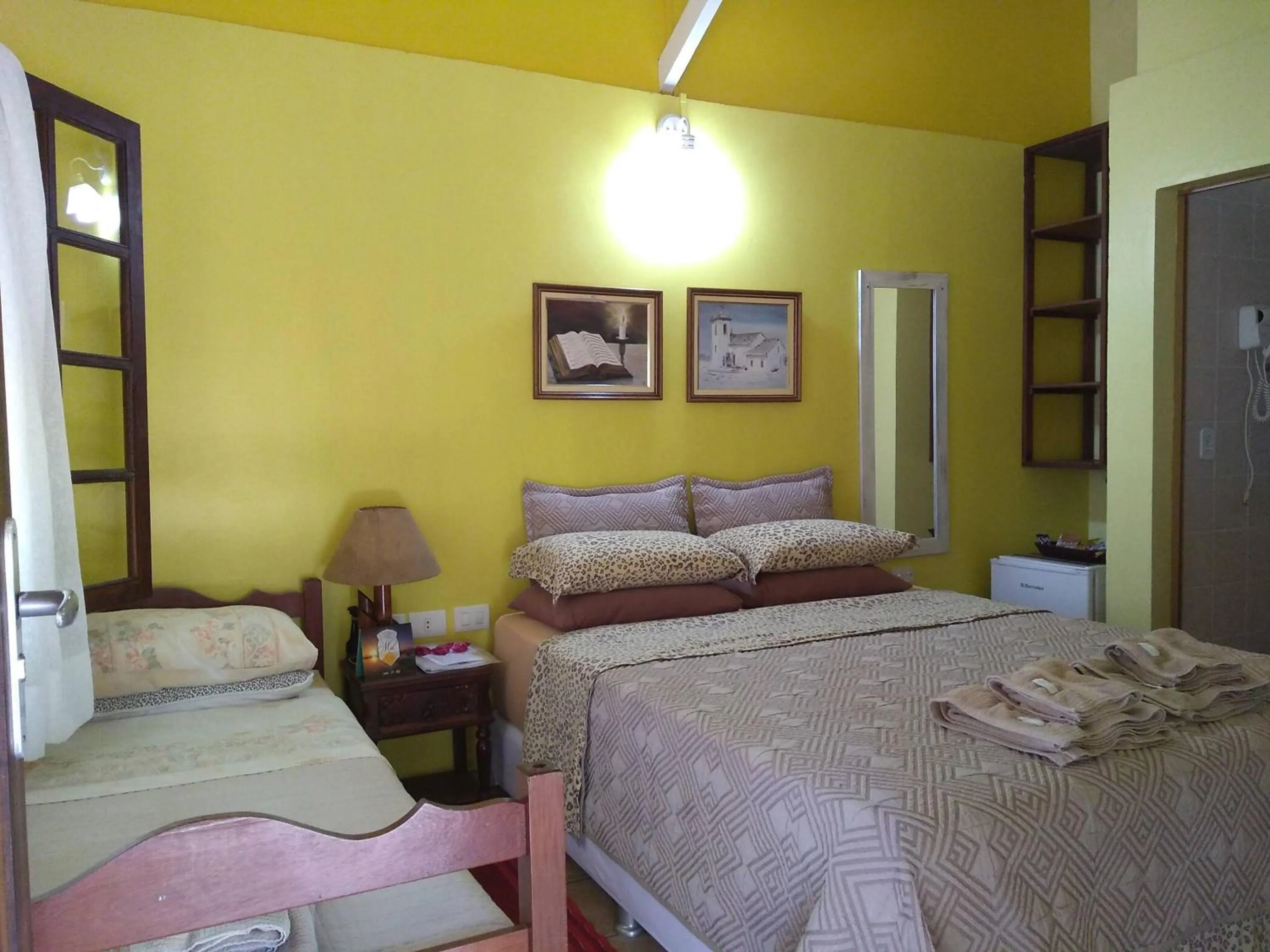 Bed in Pousada Enseada das Conchas