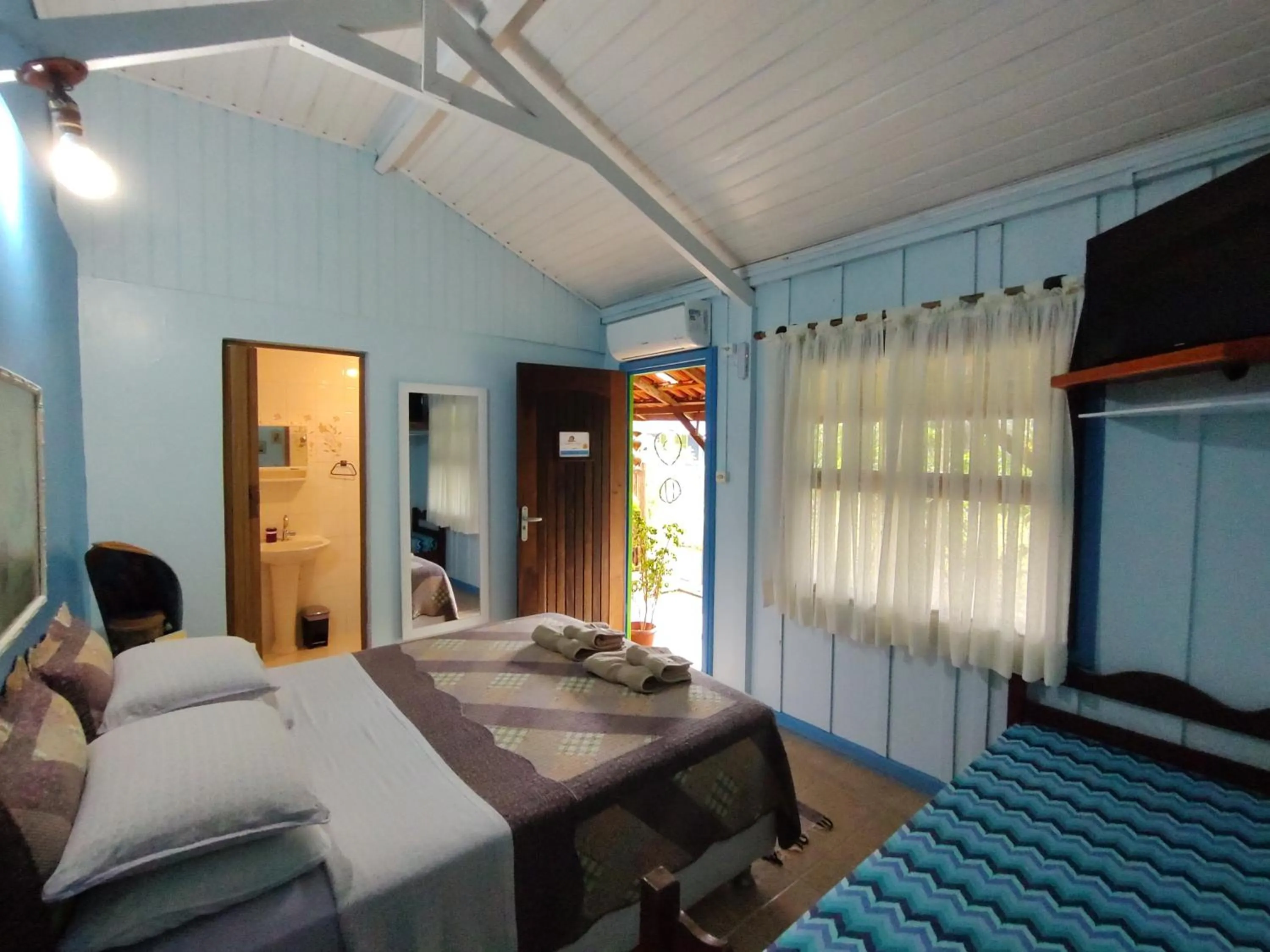 Bed in Pousada Enseada das Conchas