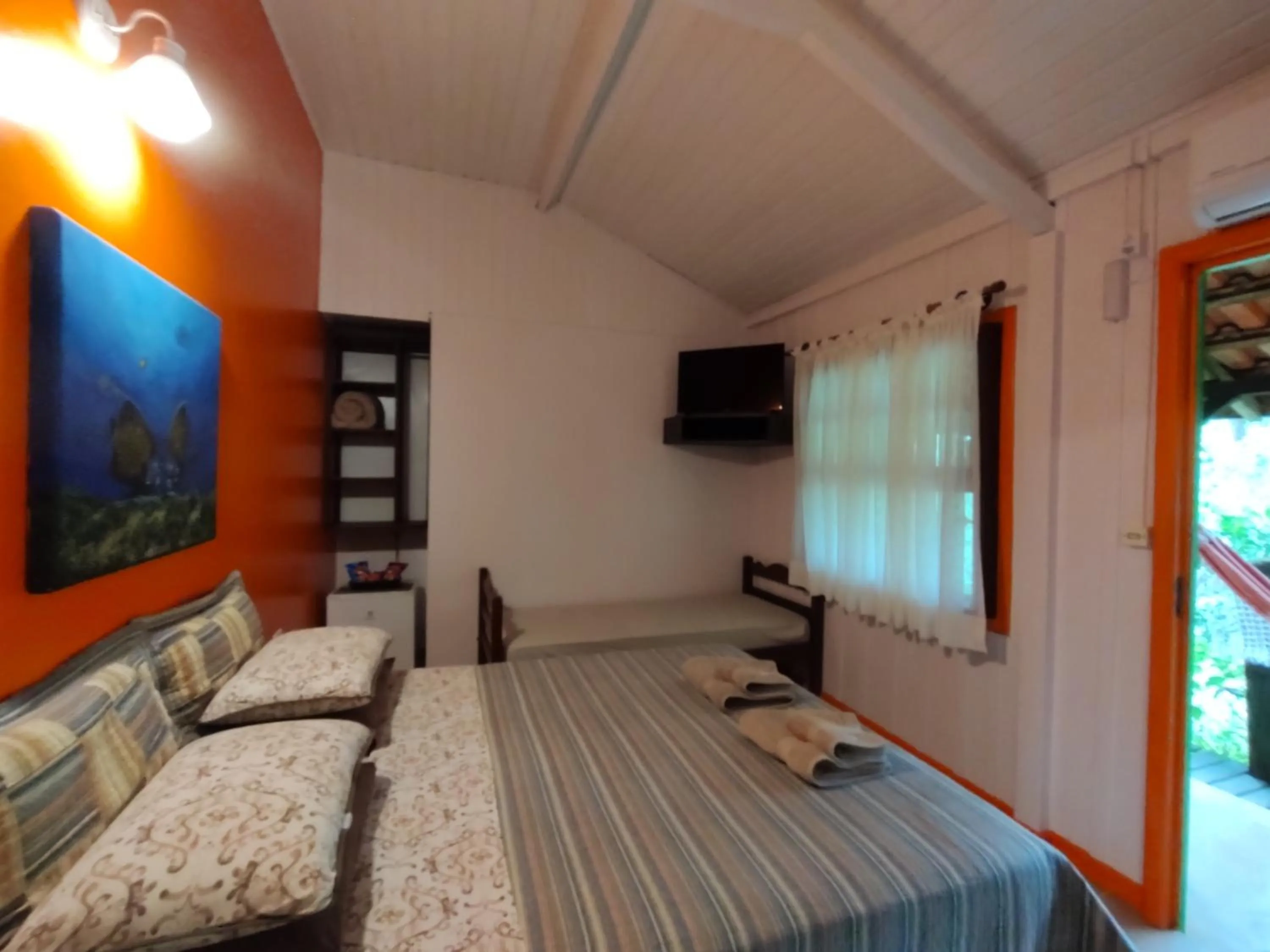 Bed in Pousada Enseada das Conchas