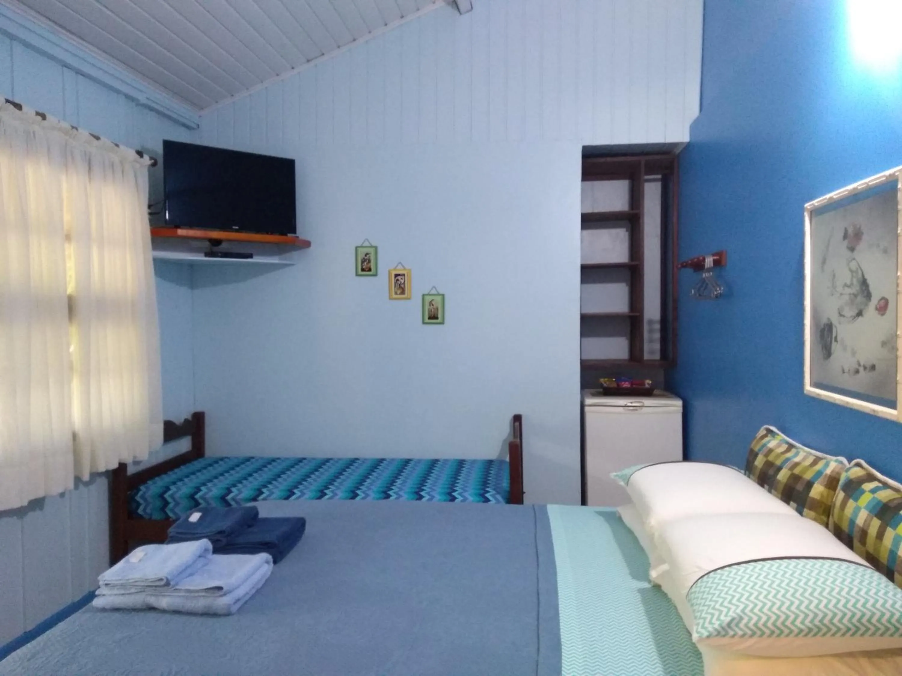 Bed in Pousada Enseada das Conchas