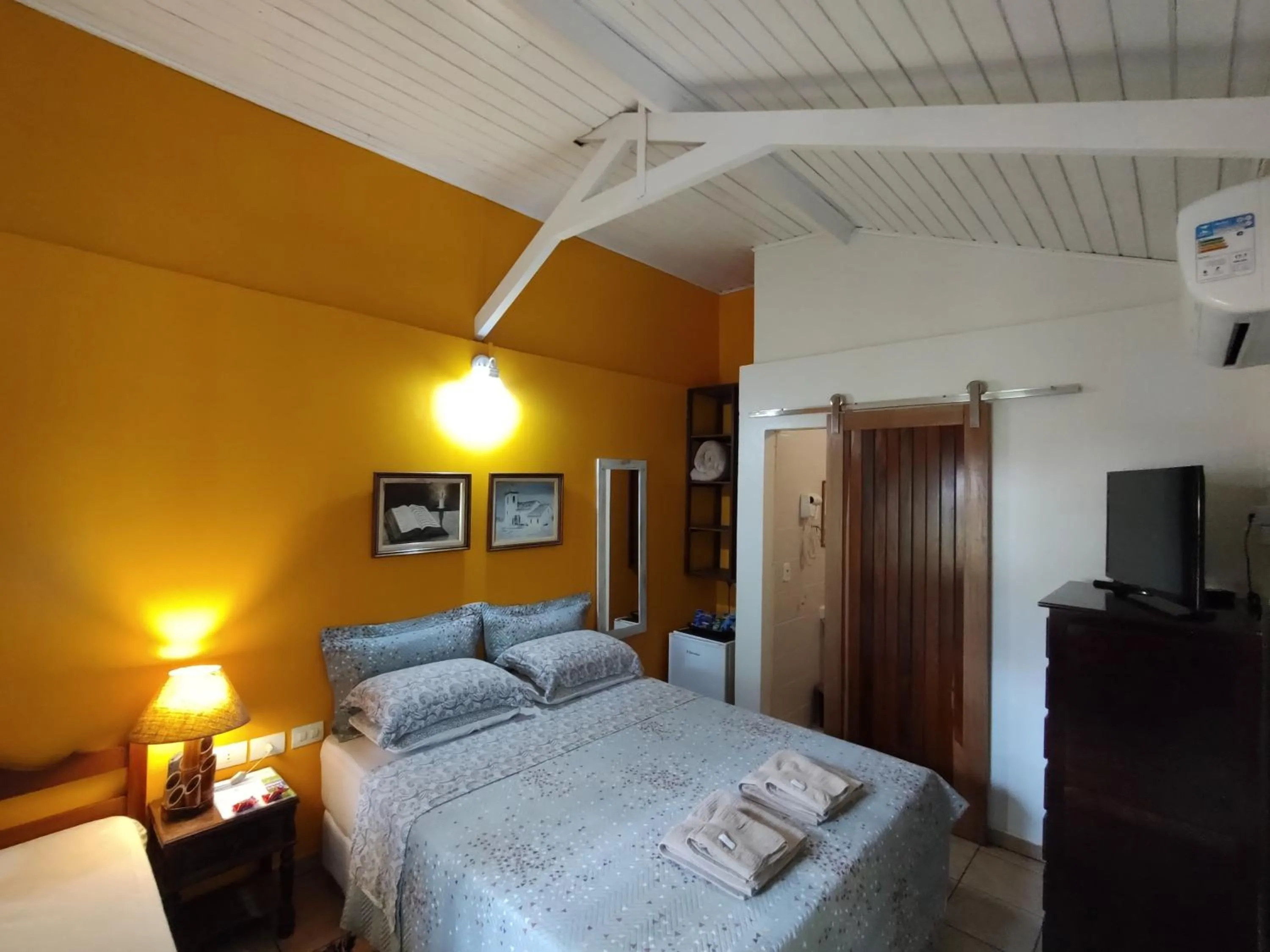 Bed in Pousada Enseada das Conchas