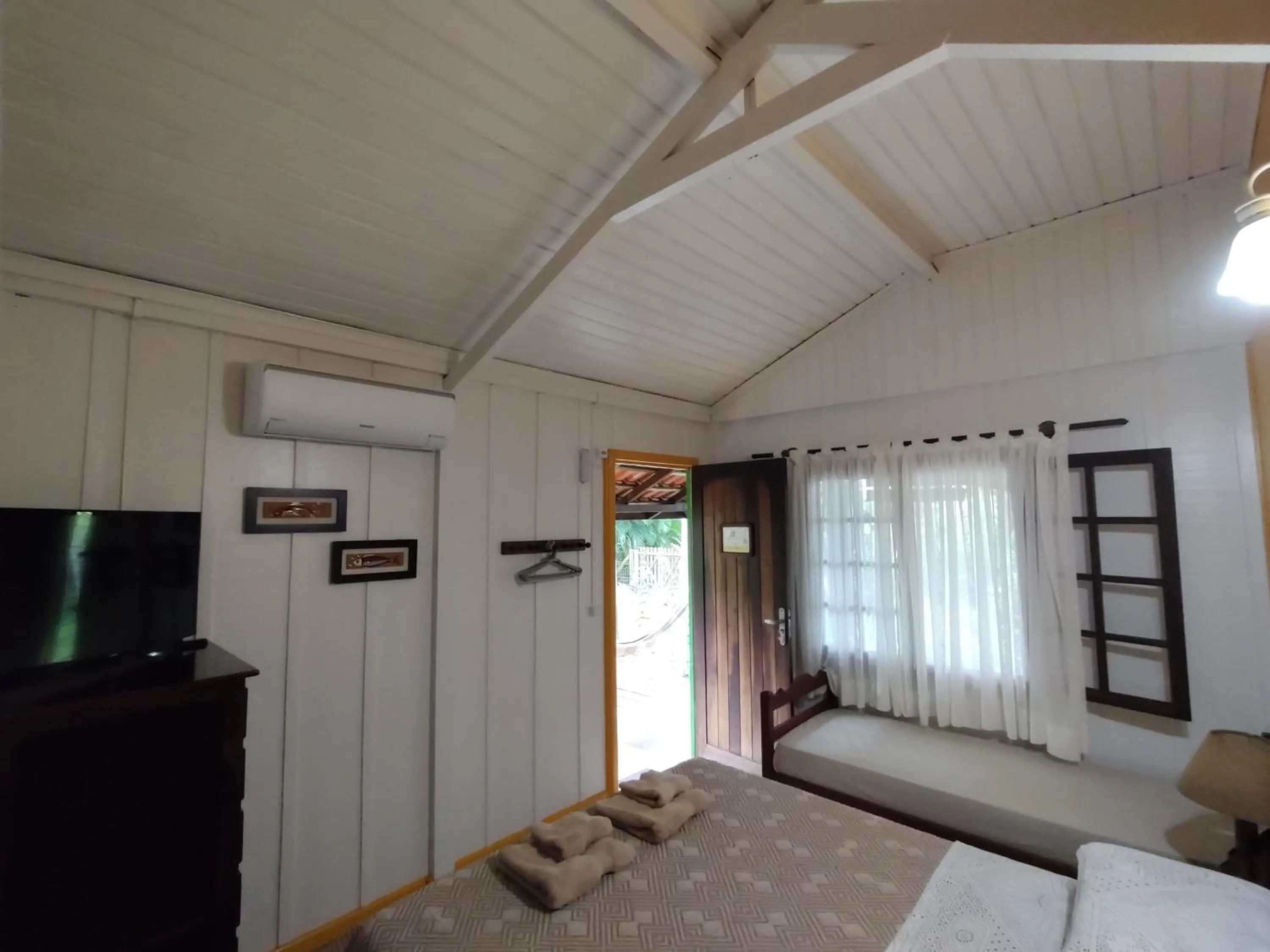 Bed in Pousada Enseada das Conchas