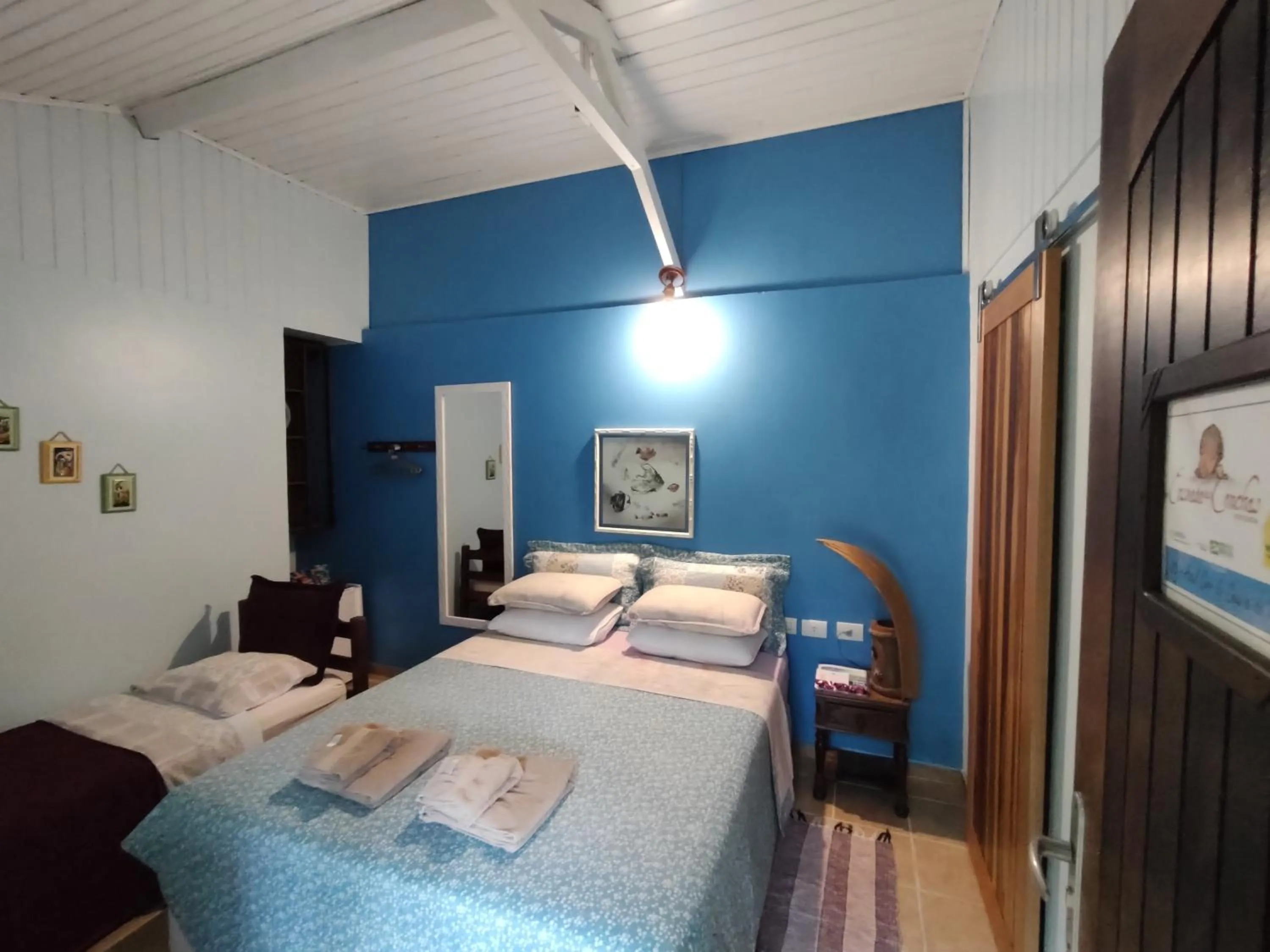 Bed in Pousada Enseada das Conchas