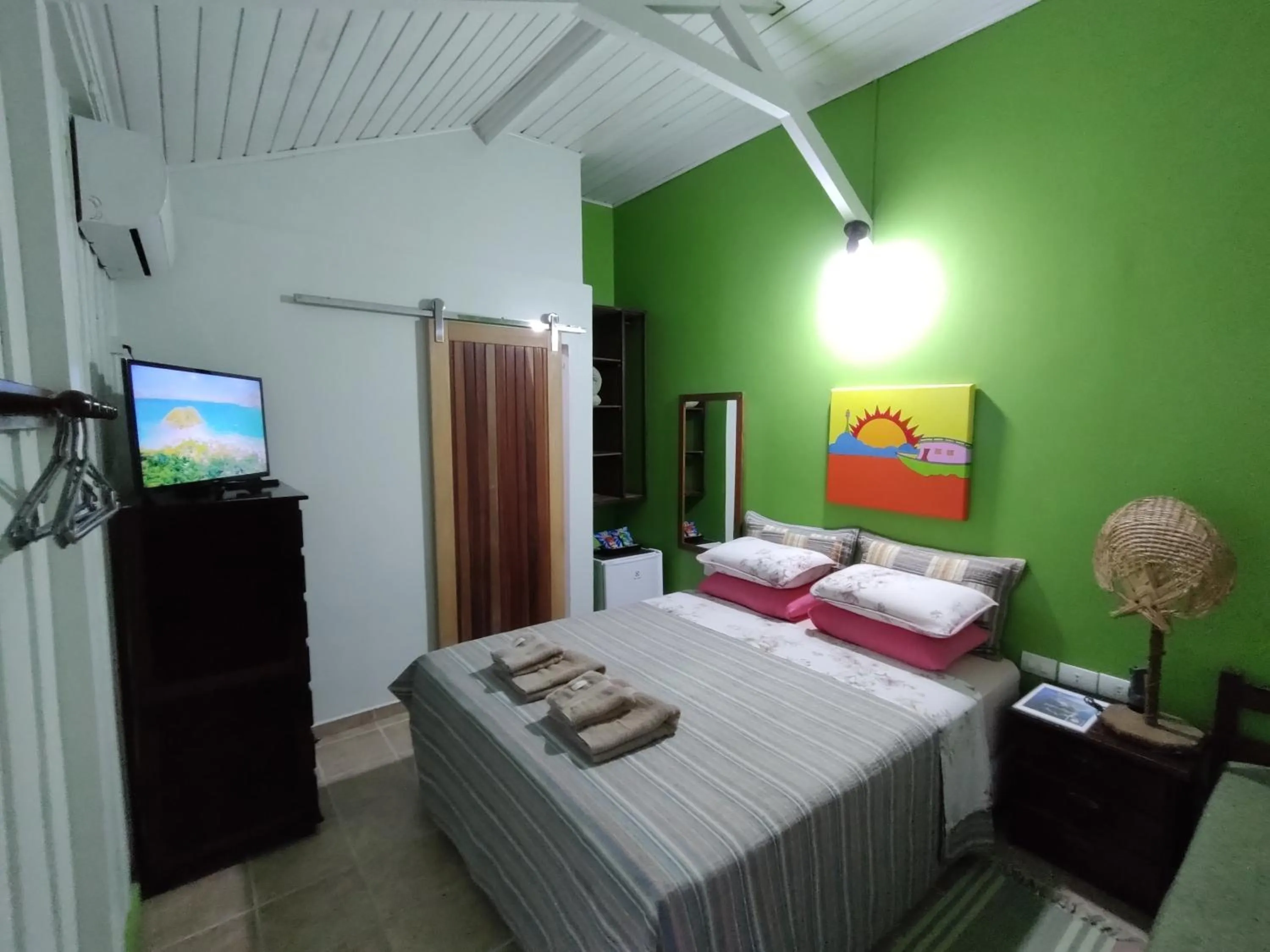 Bed in Pousada Enseada das Conchas