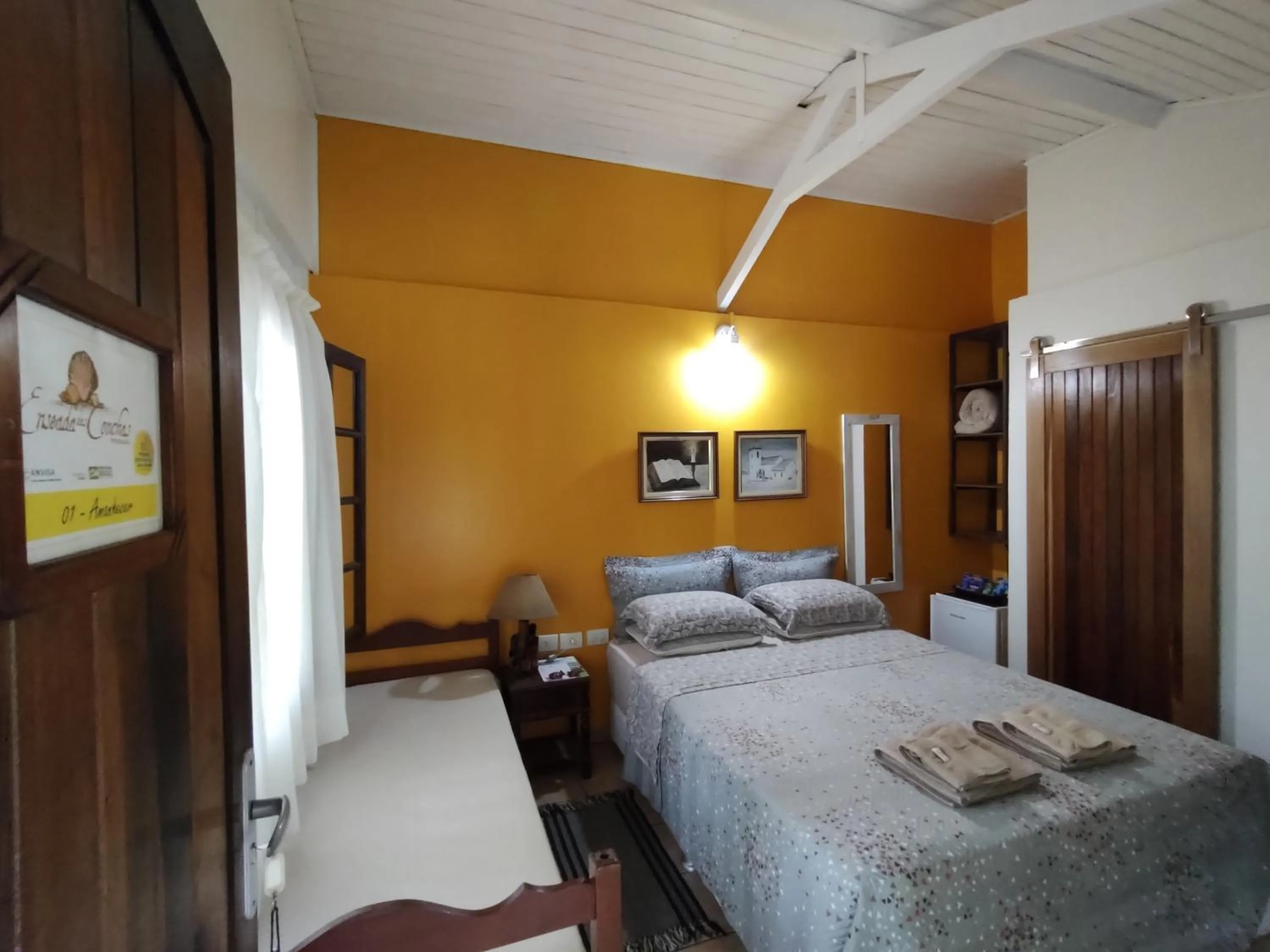 Bed in Pousada Enseada das Conchas