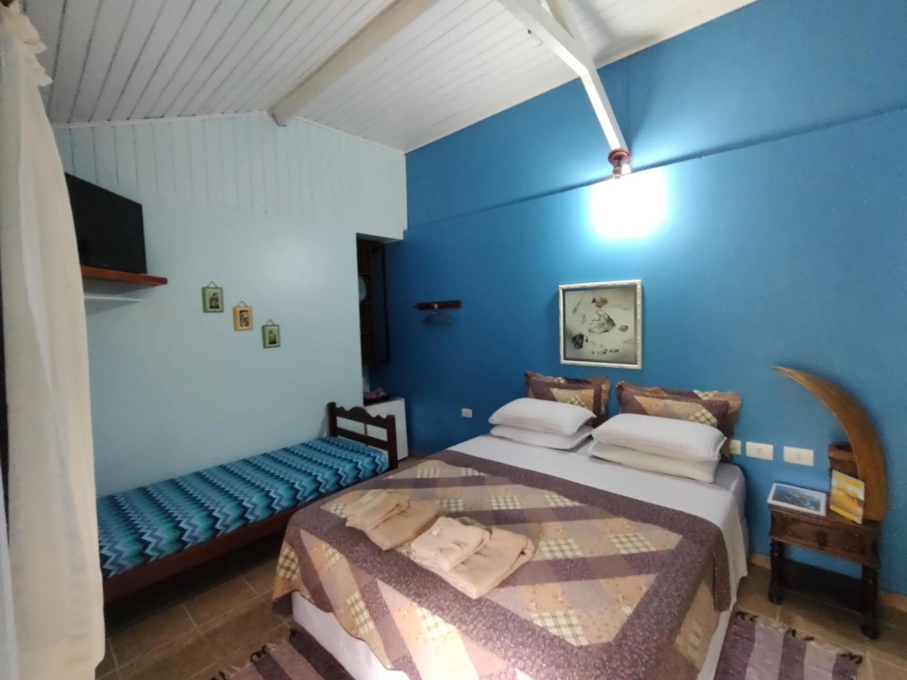 Bed in Pousada Enseada das Conchas