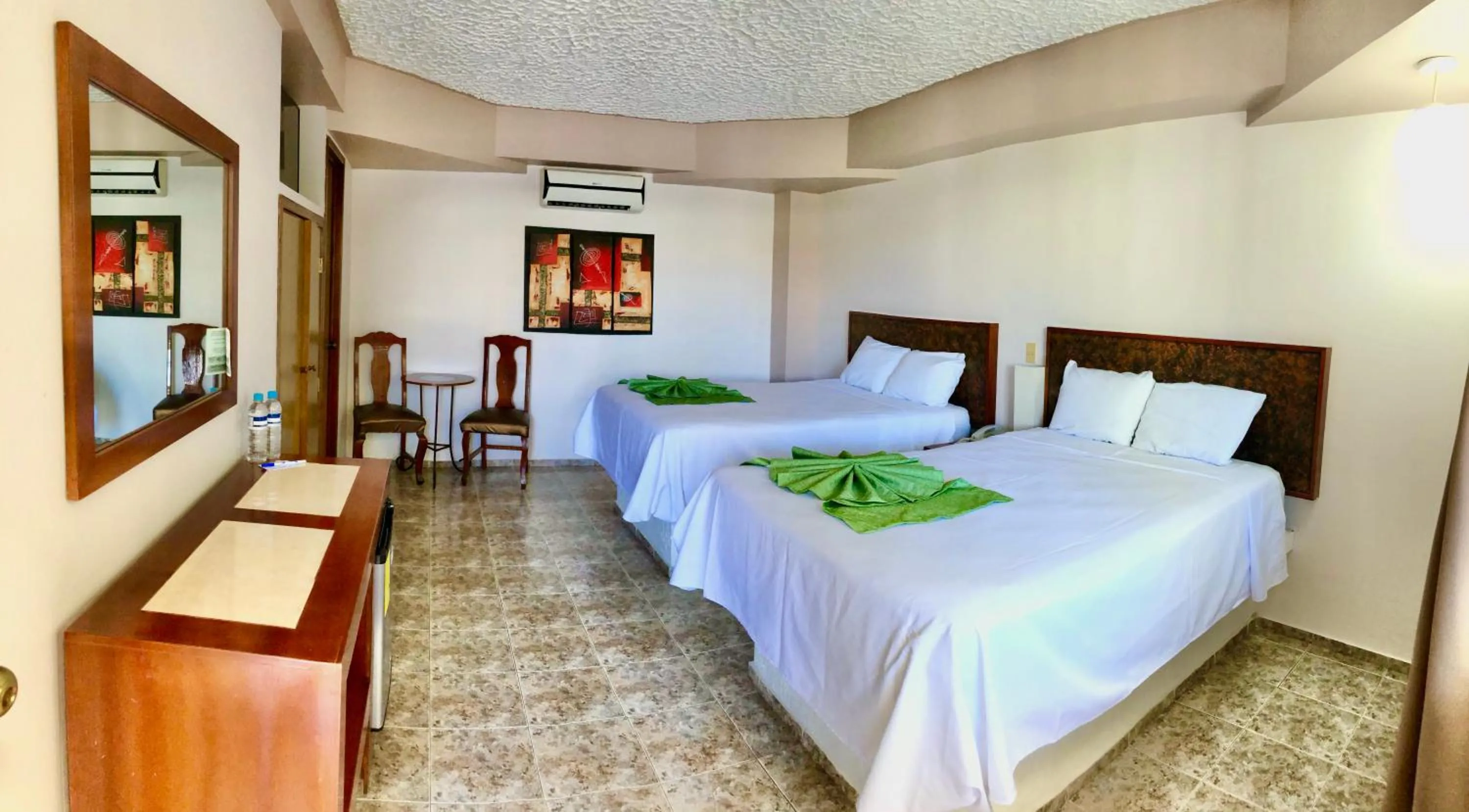 air conditioner, Bed in Hotel del Camino Real