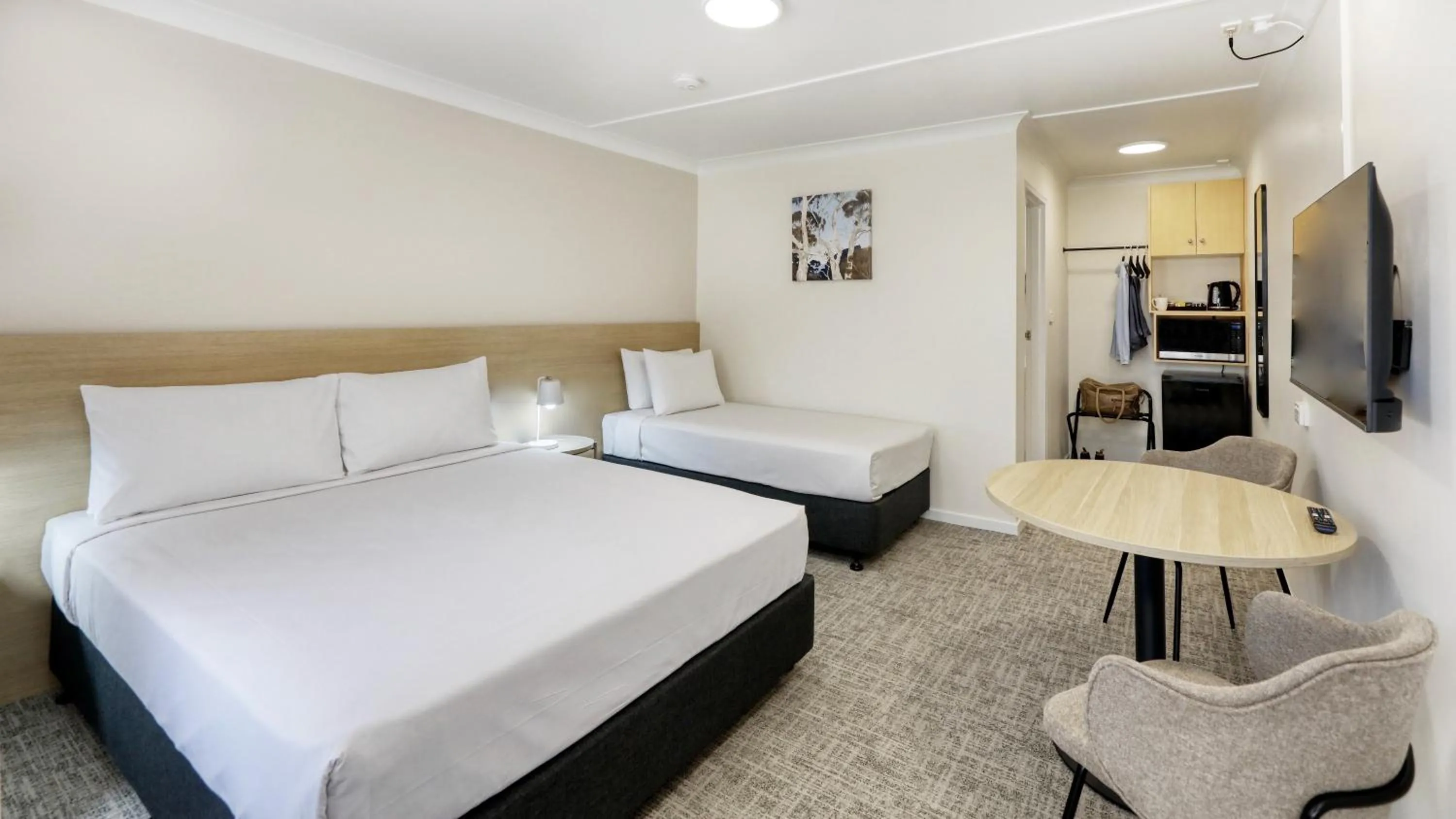 Essential Queen Room in The Phoenix Artesian Spa Resort and Accommodation