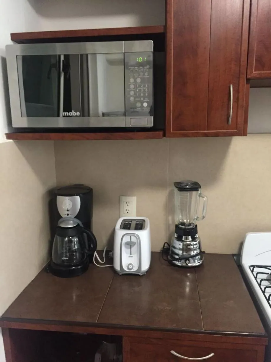 Kitchen or kitchenette in Zenharmony Suites