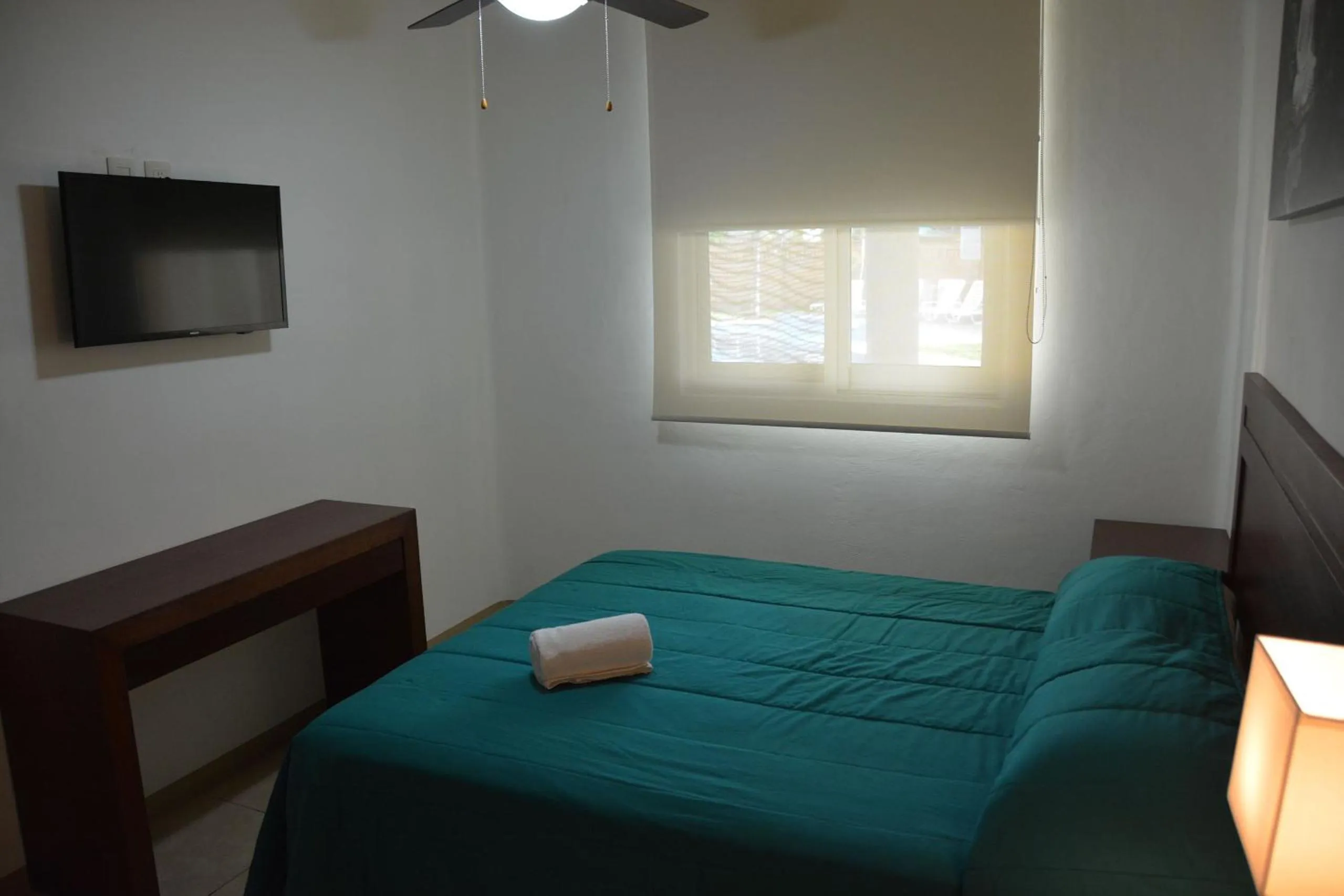 Bed in Zenharmony Suites