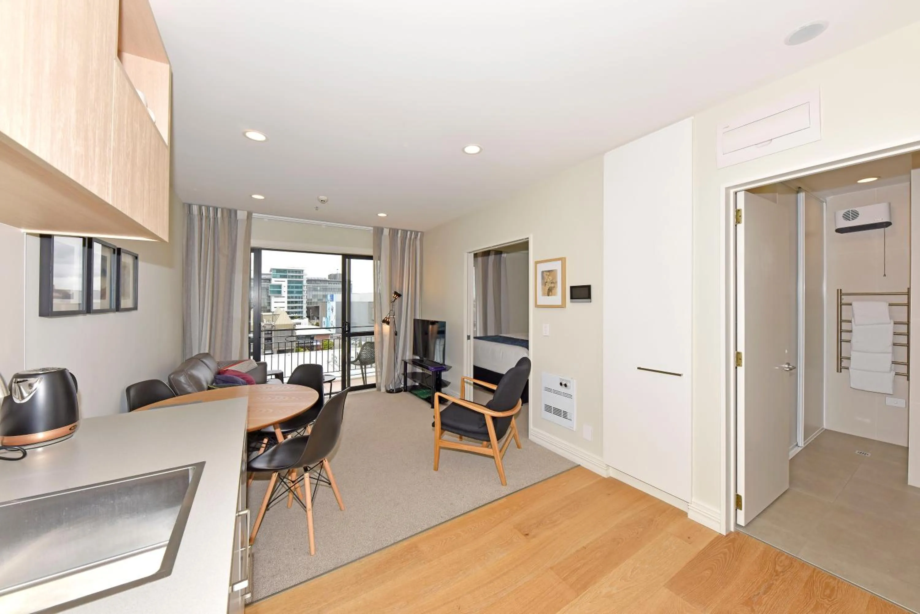 Kitchen or kitchenette in West Fitzroy Apartments