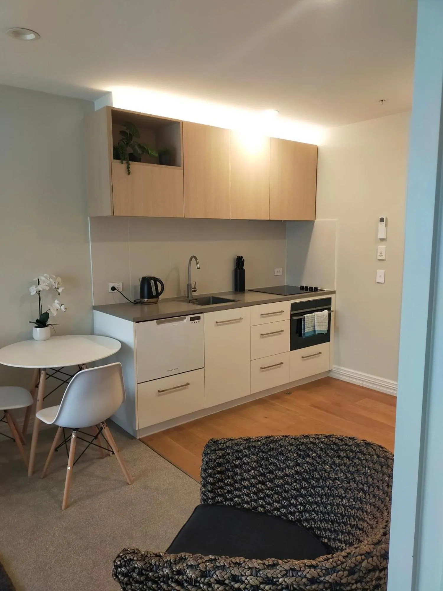 Kitchen or kitchenette in West Fitzroy Apartments