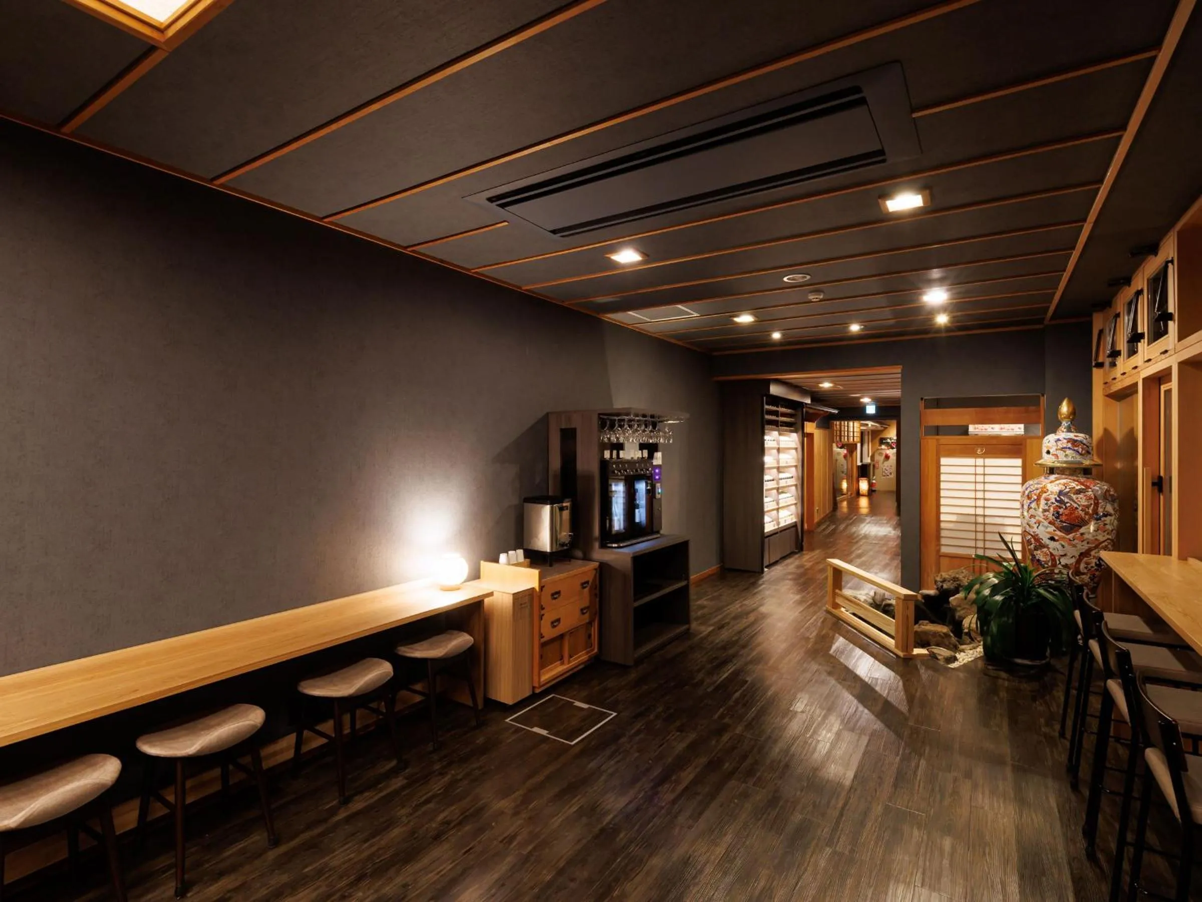 Communal lounge/ TV room in Oiwakeya Ryokan