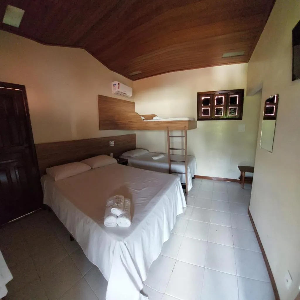 Bed in Pousada da praça