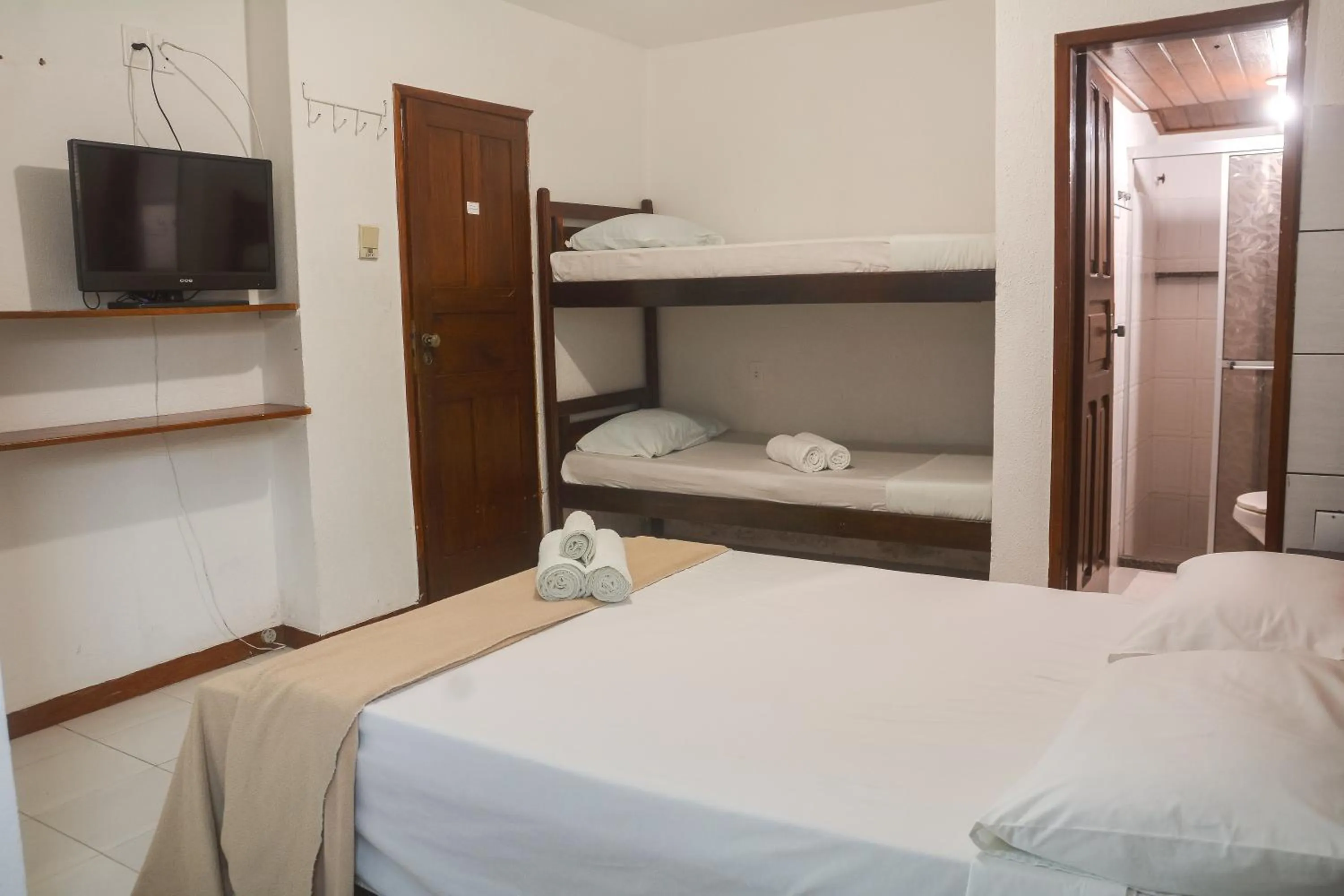 Bed in Pousada da praça