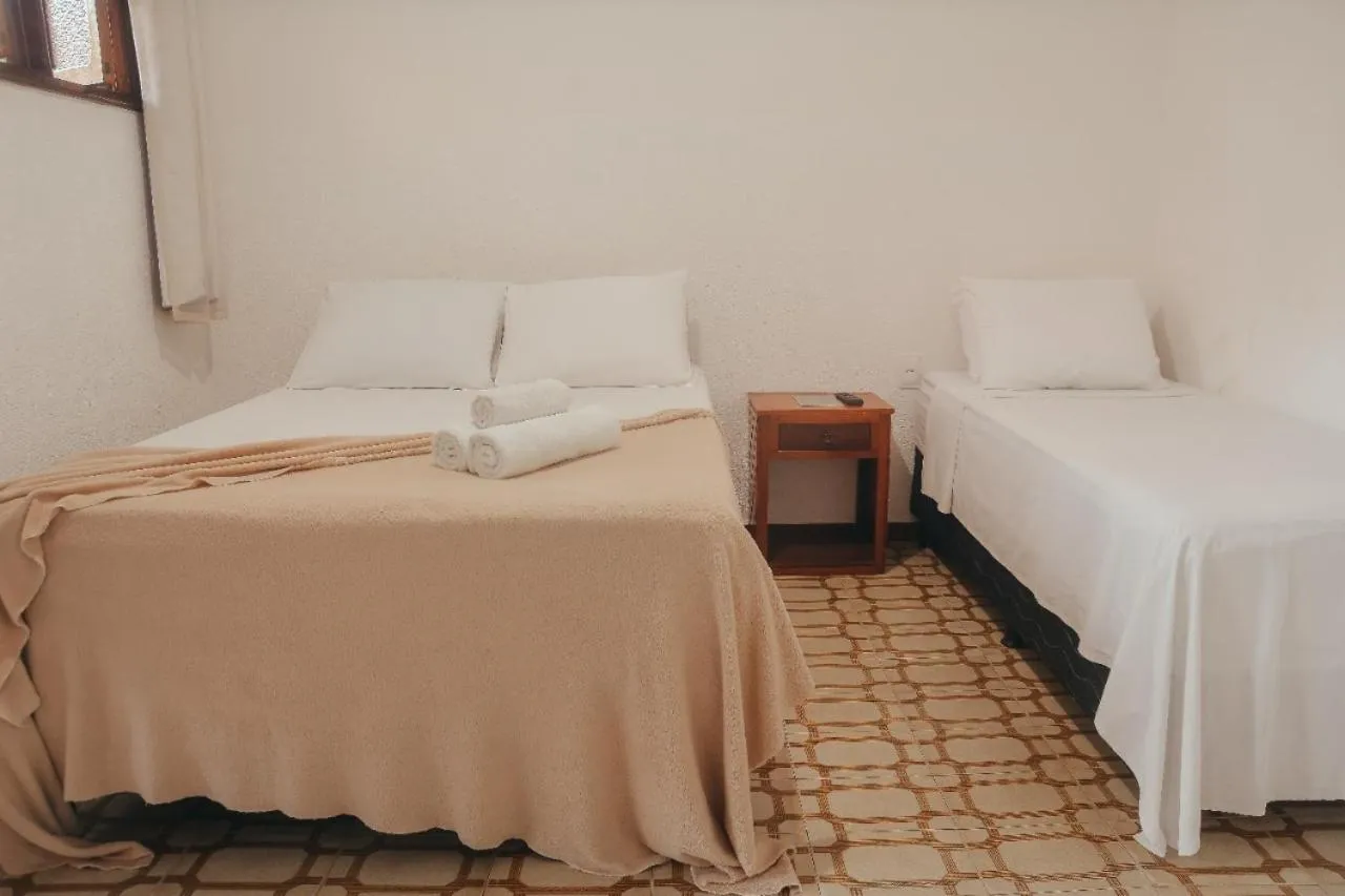 Bed in Pousada da praça