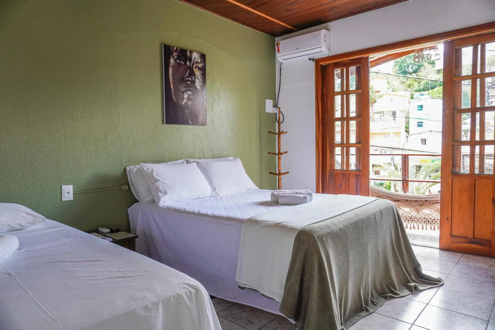 Bed in Pousada da praça