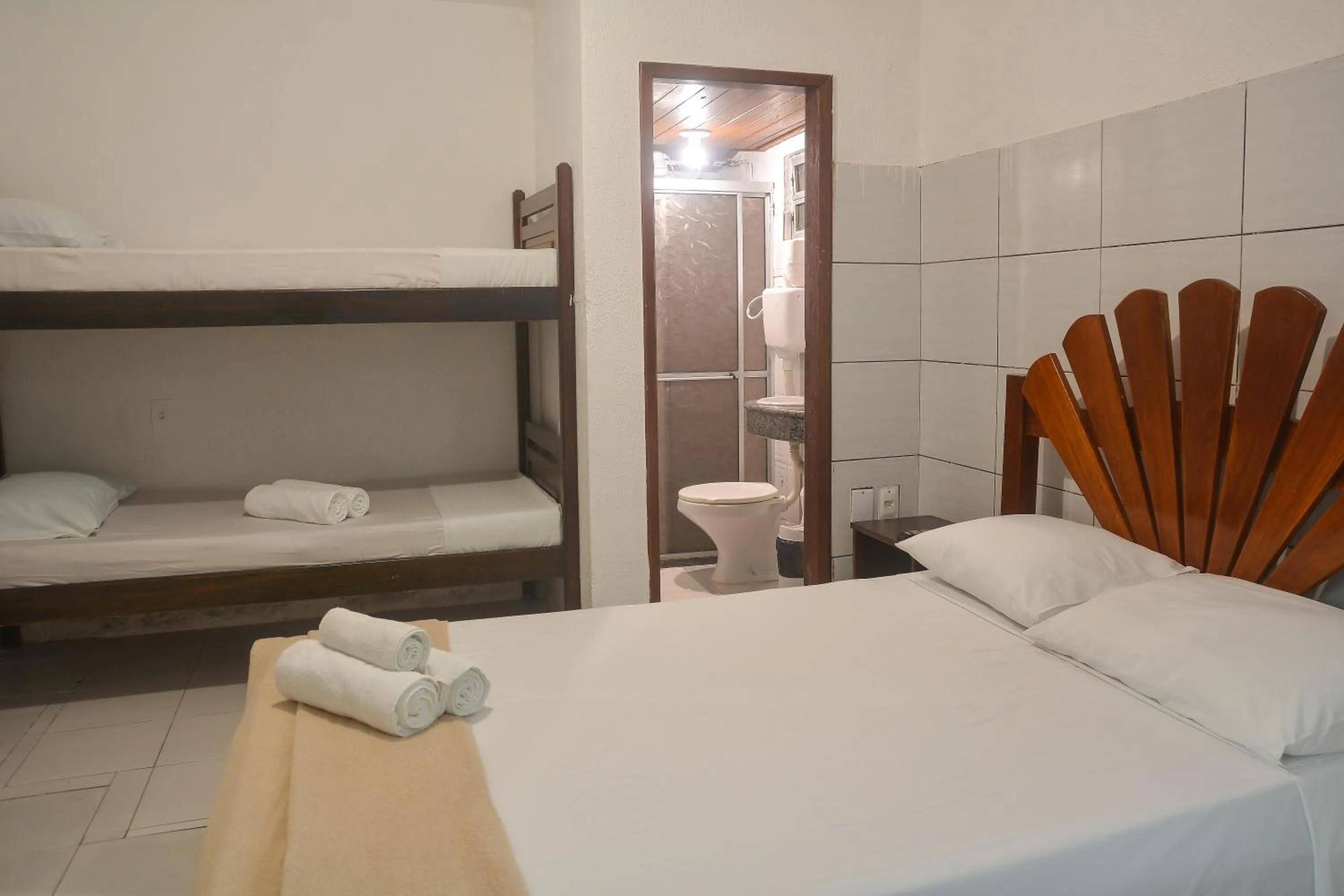 Bed in Pousada da praça