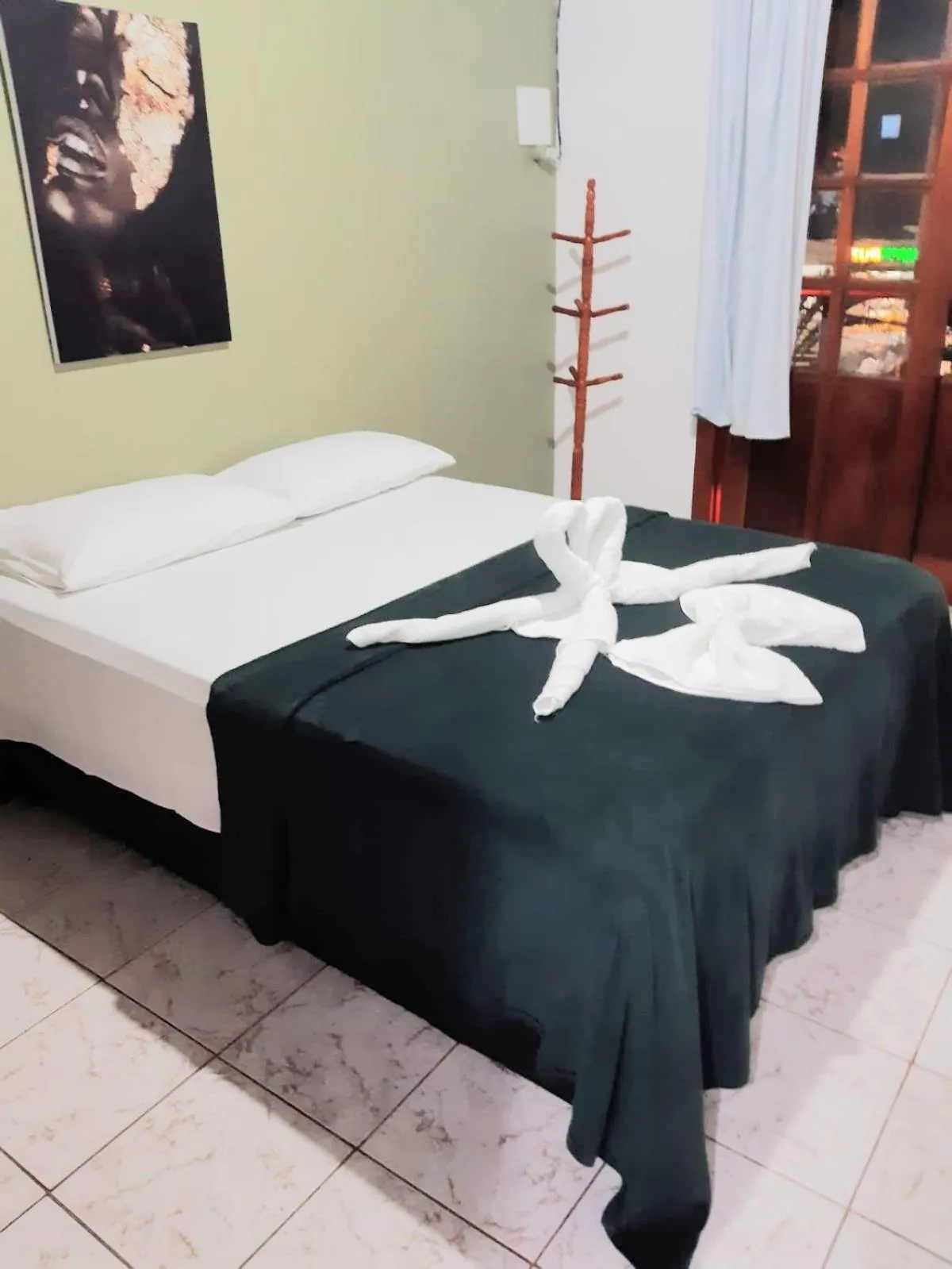 Bed in Pousada da praça