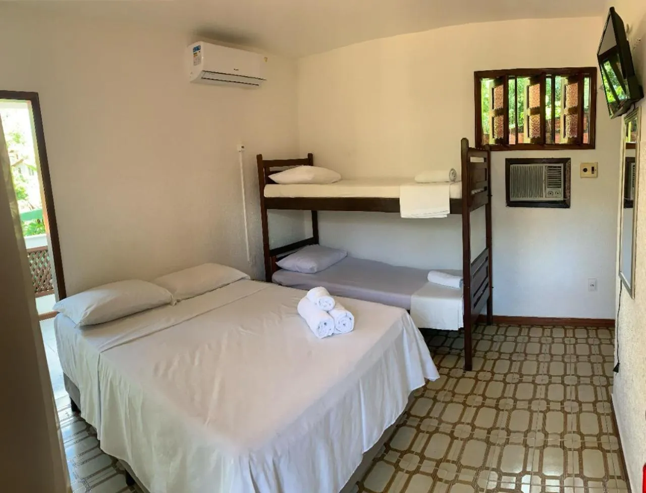 Bed in Pousada da praça