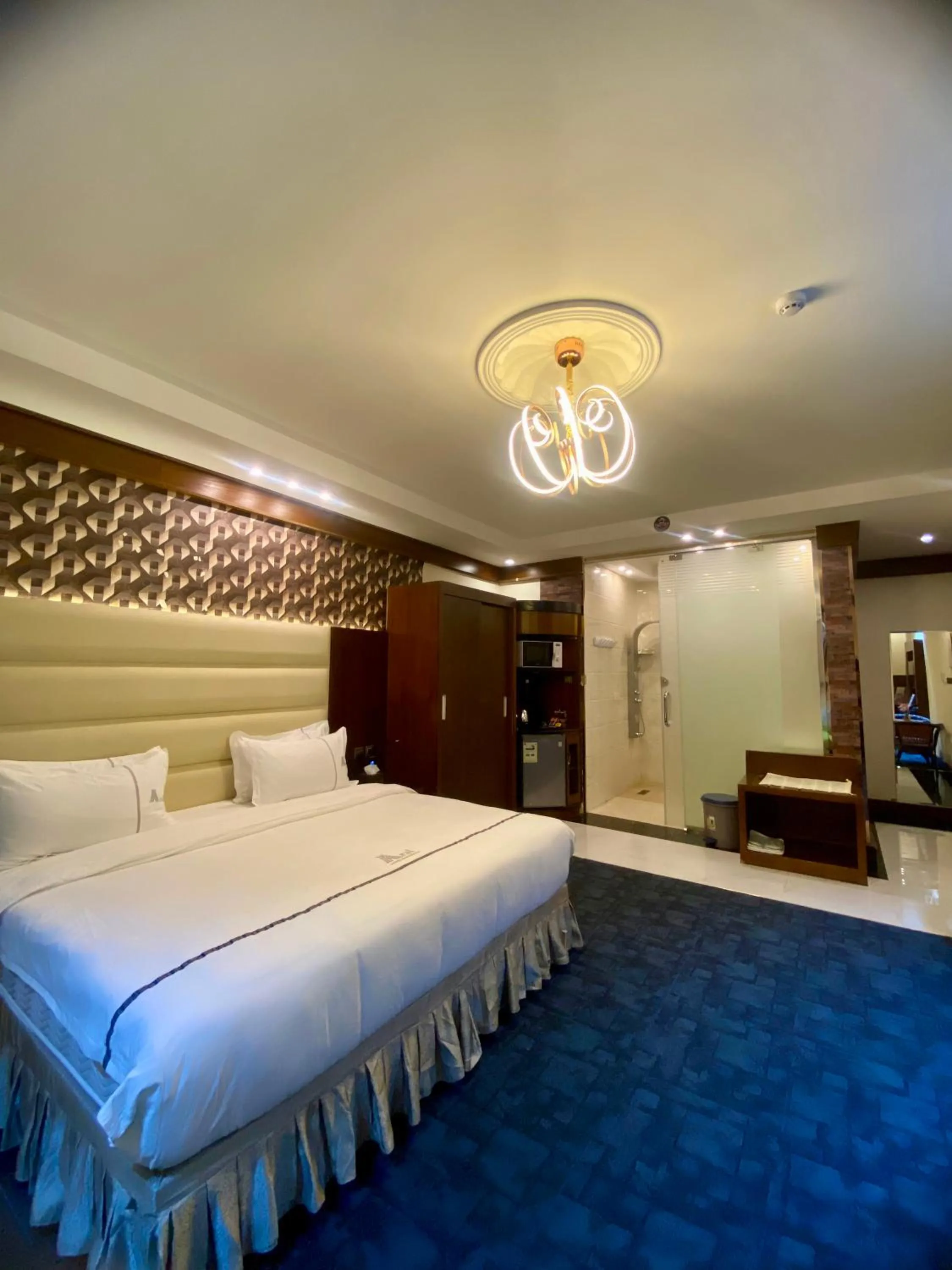 Bed in Aral Hotel Apartments