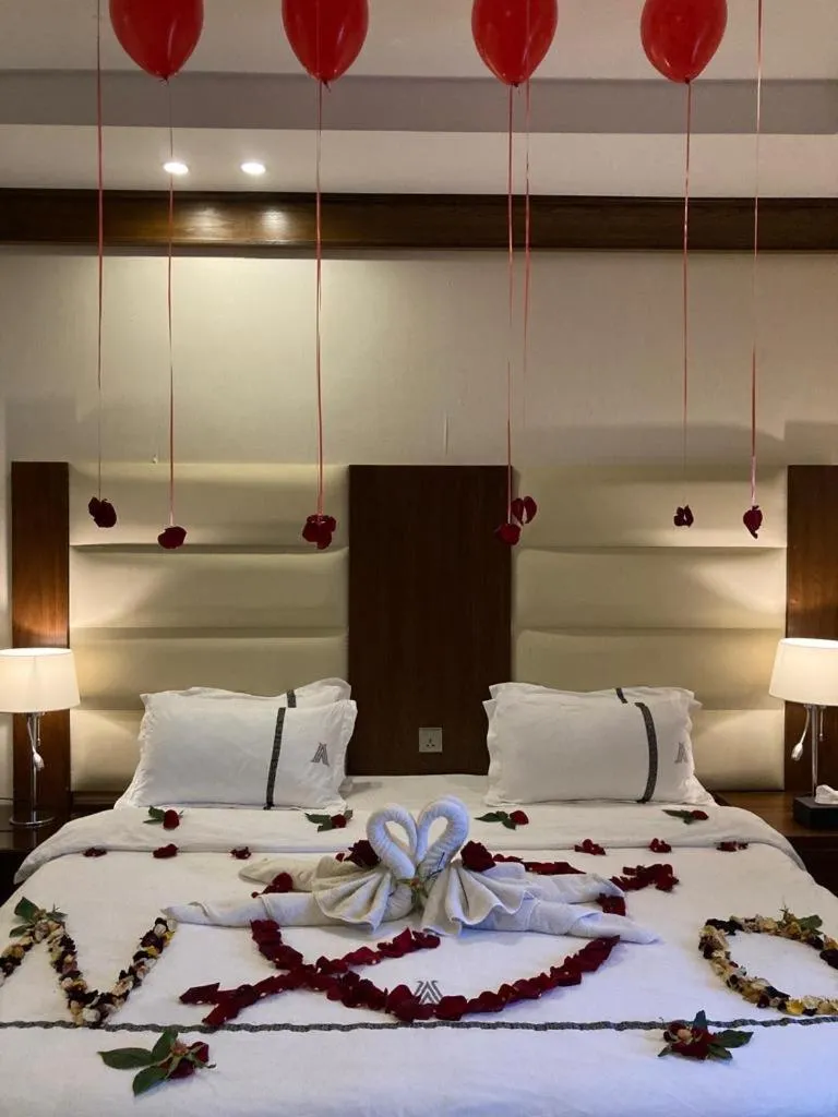 Bed in Aral Hotel Apartments