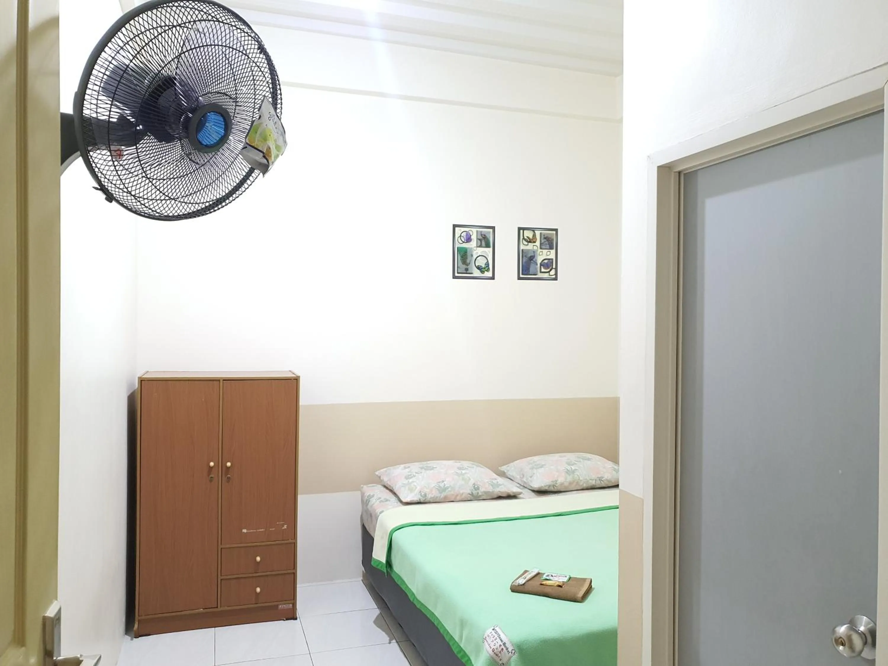 Bedroom, Bed in Delta Inn Bogor Syariah for Indonesian Only