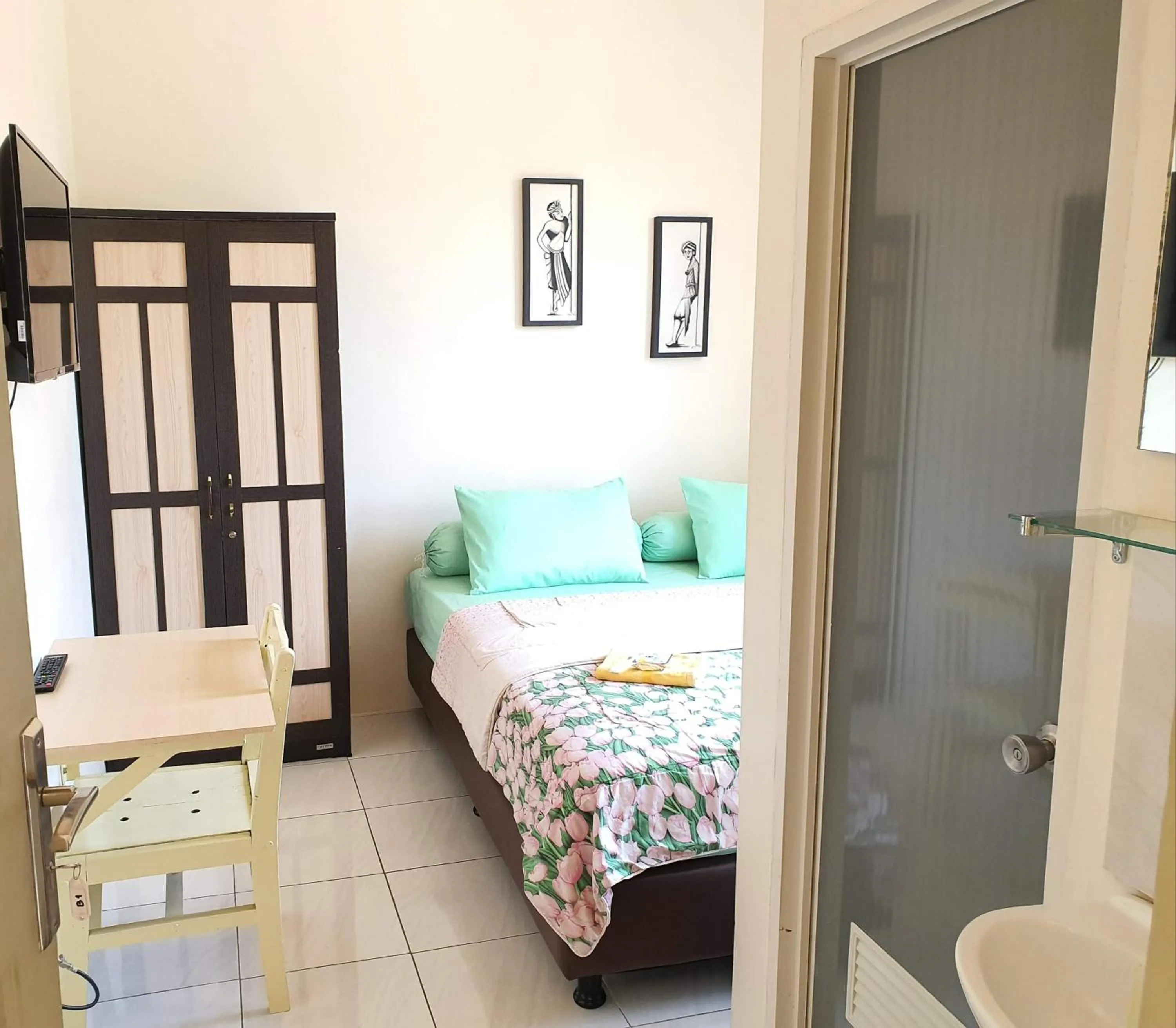 Bed in Delta Inn Bogor Syariah for Indonesian Only