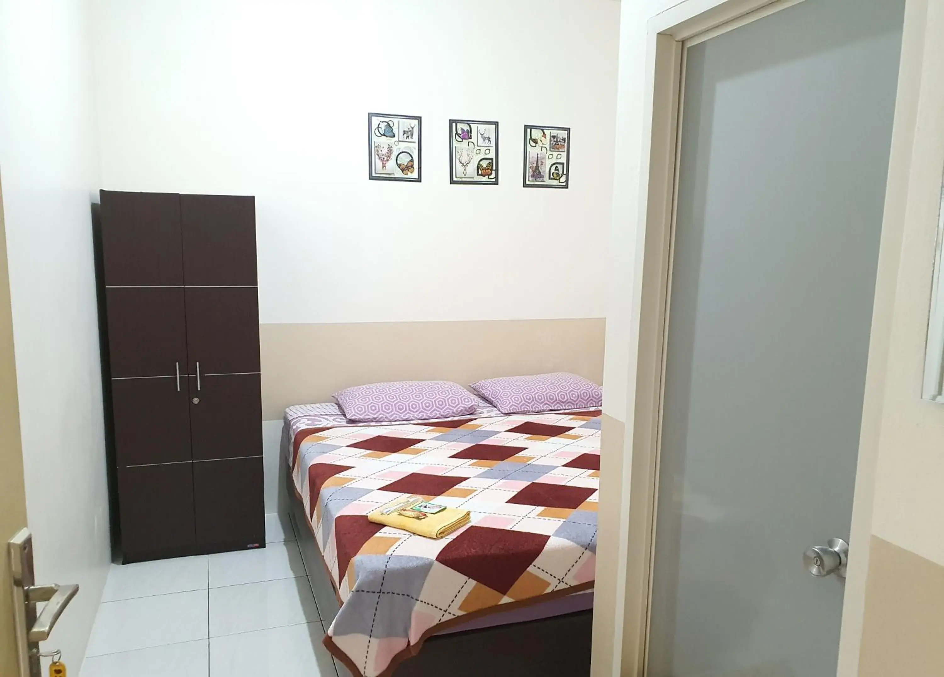 Bedroom, Bed in Delta Inn Bogor Syariah for Indonesian Only Bedroom, Bed in Delta Inn Bogor Syariah for Indonesian Only