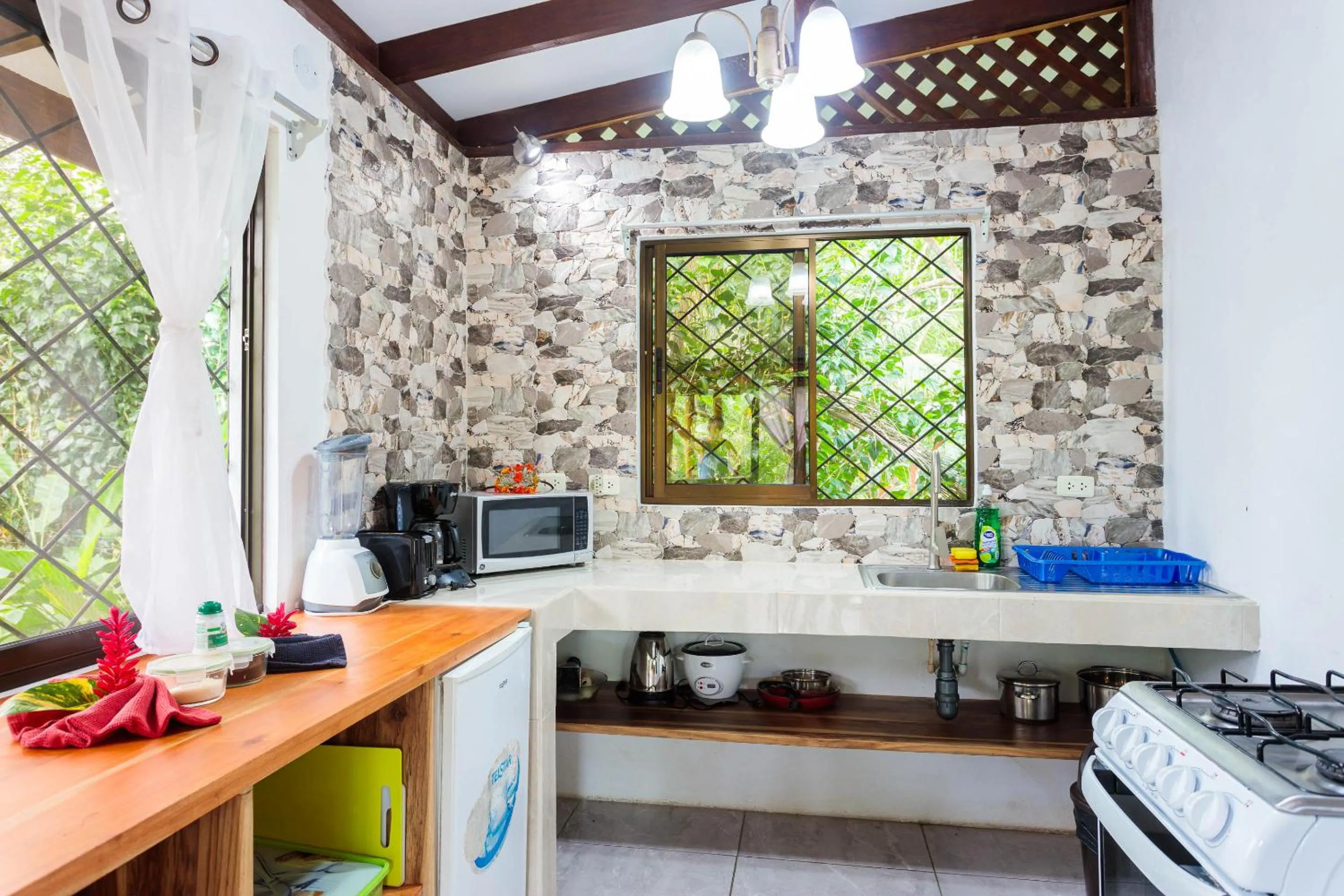 Kitchen or kitchenette in Bungalows Ache Cozy House
