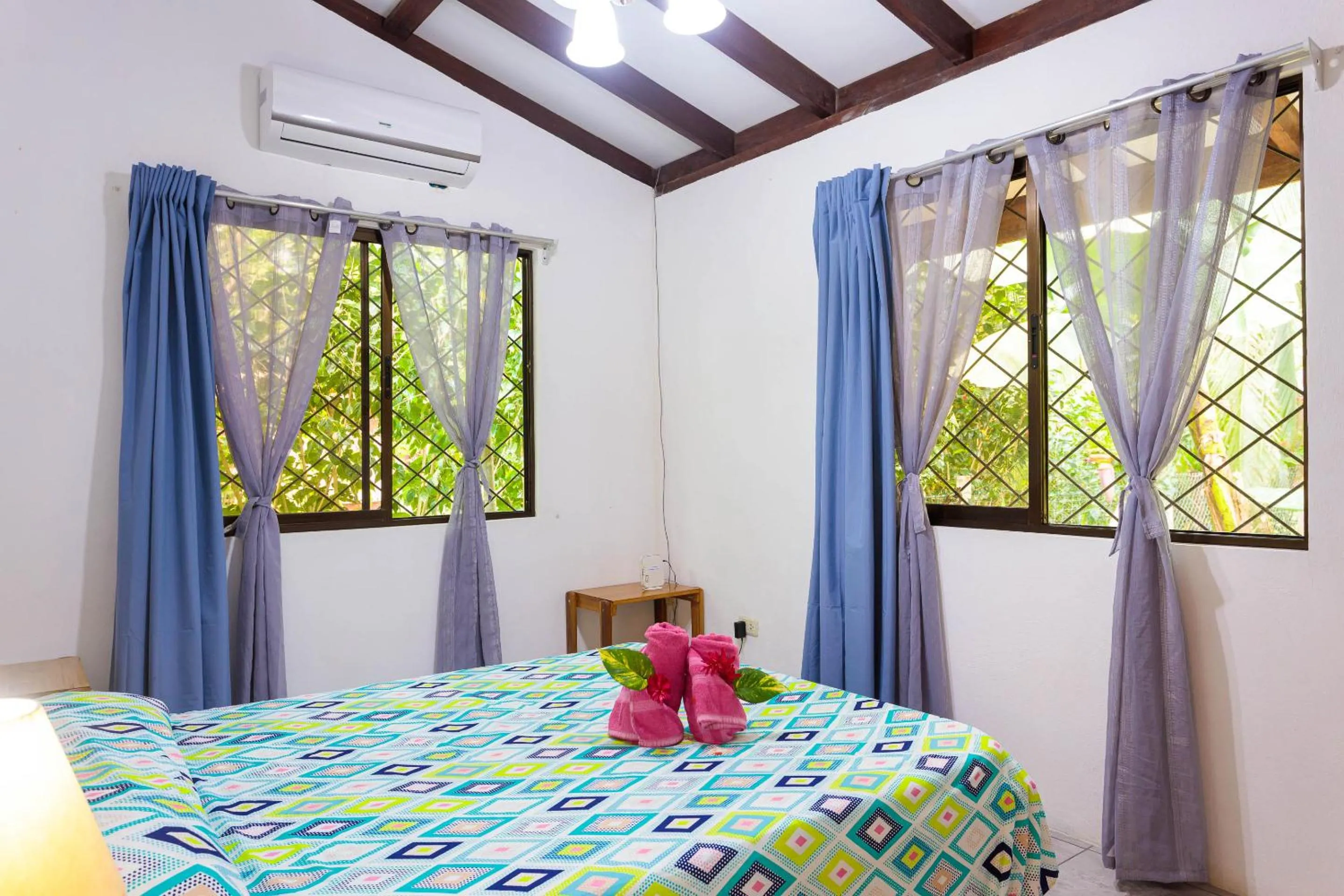 Bed in Bungalows Ache Cozy House