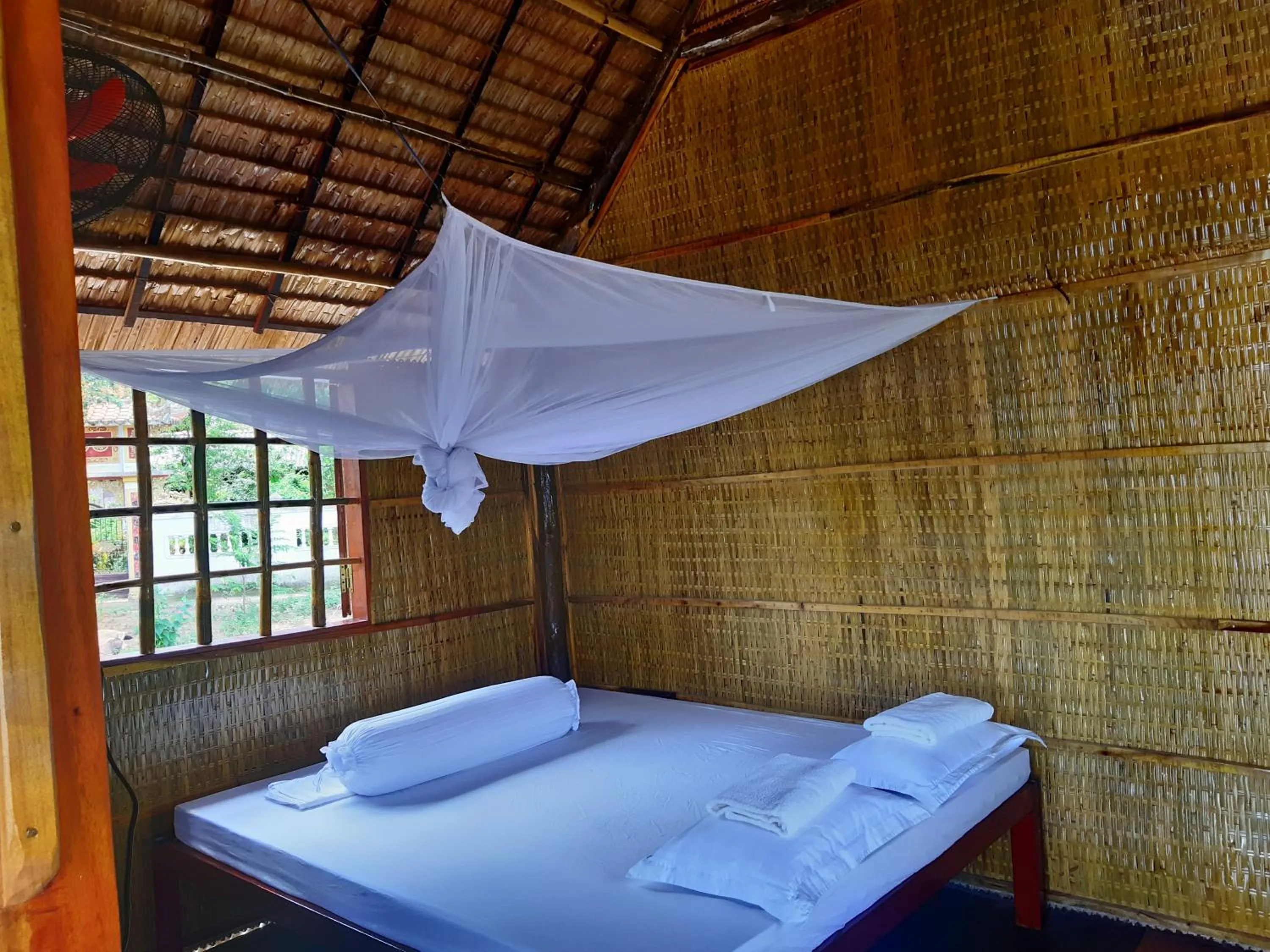 Bed in mekong riverside homestay