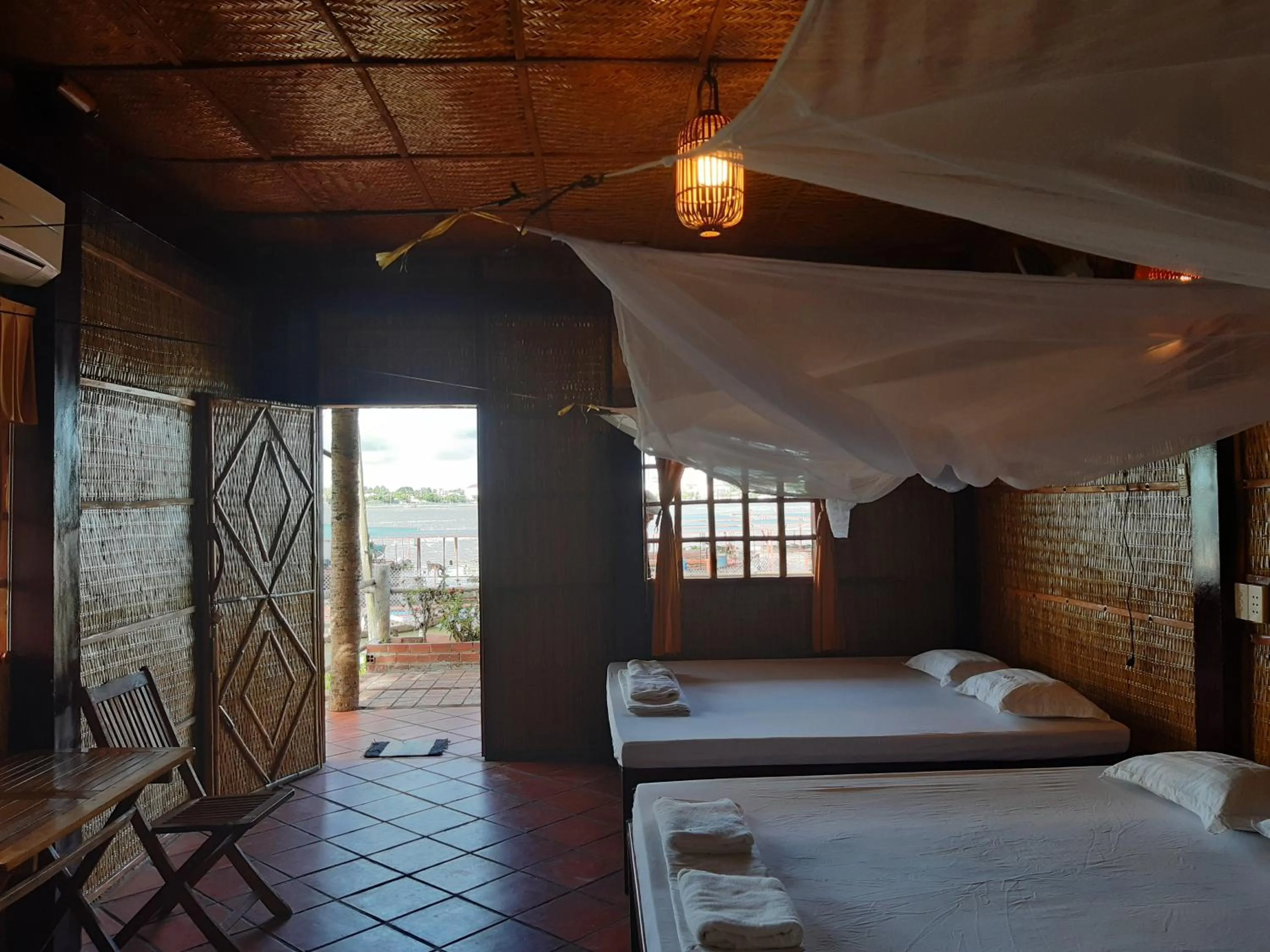Bed in mekong riverside homestay