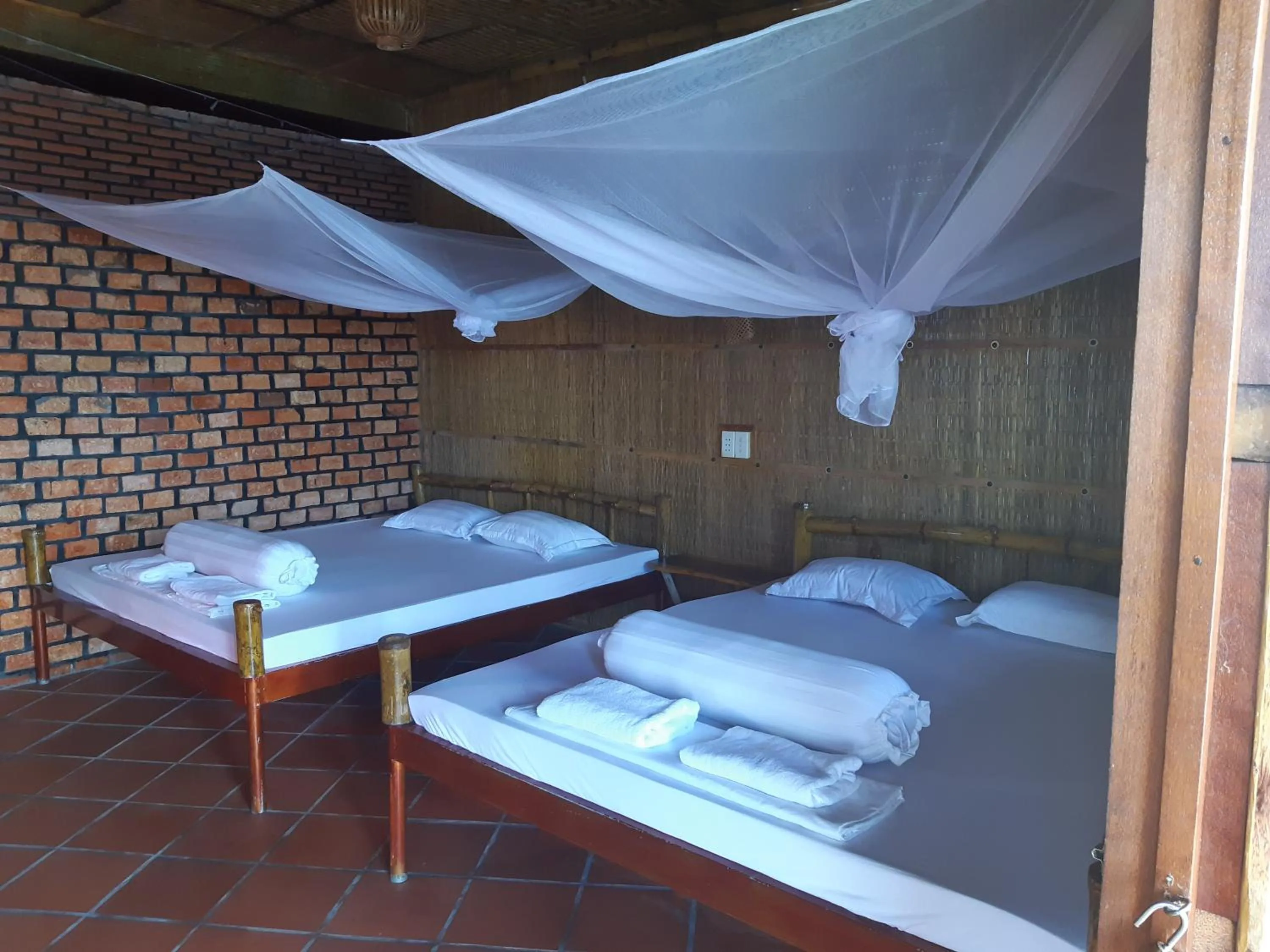 Bed in mekong riverside homestay