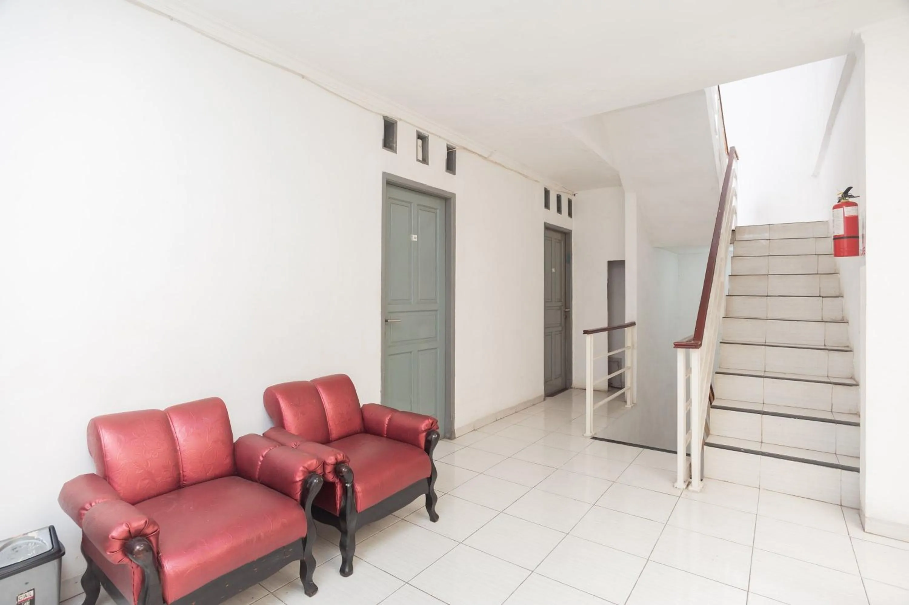 Living room in RedDoorz Syariah near Grand Galaxy Park