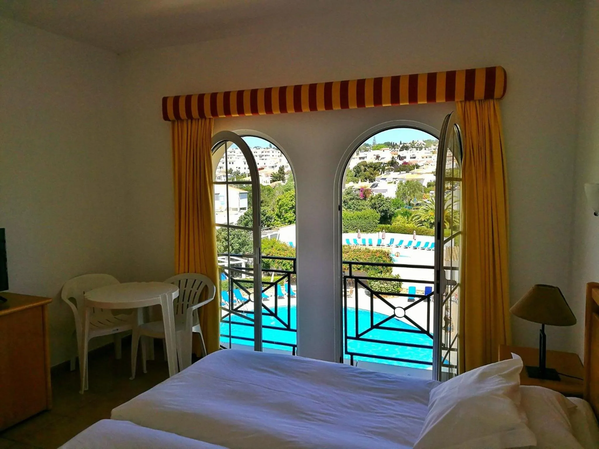 Bed in Luz Bay Hotel