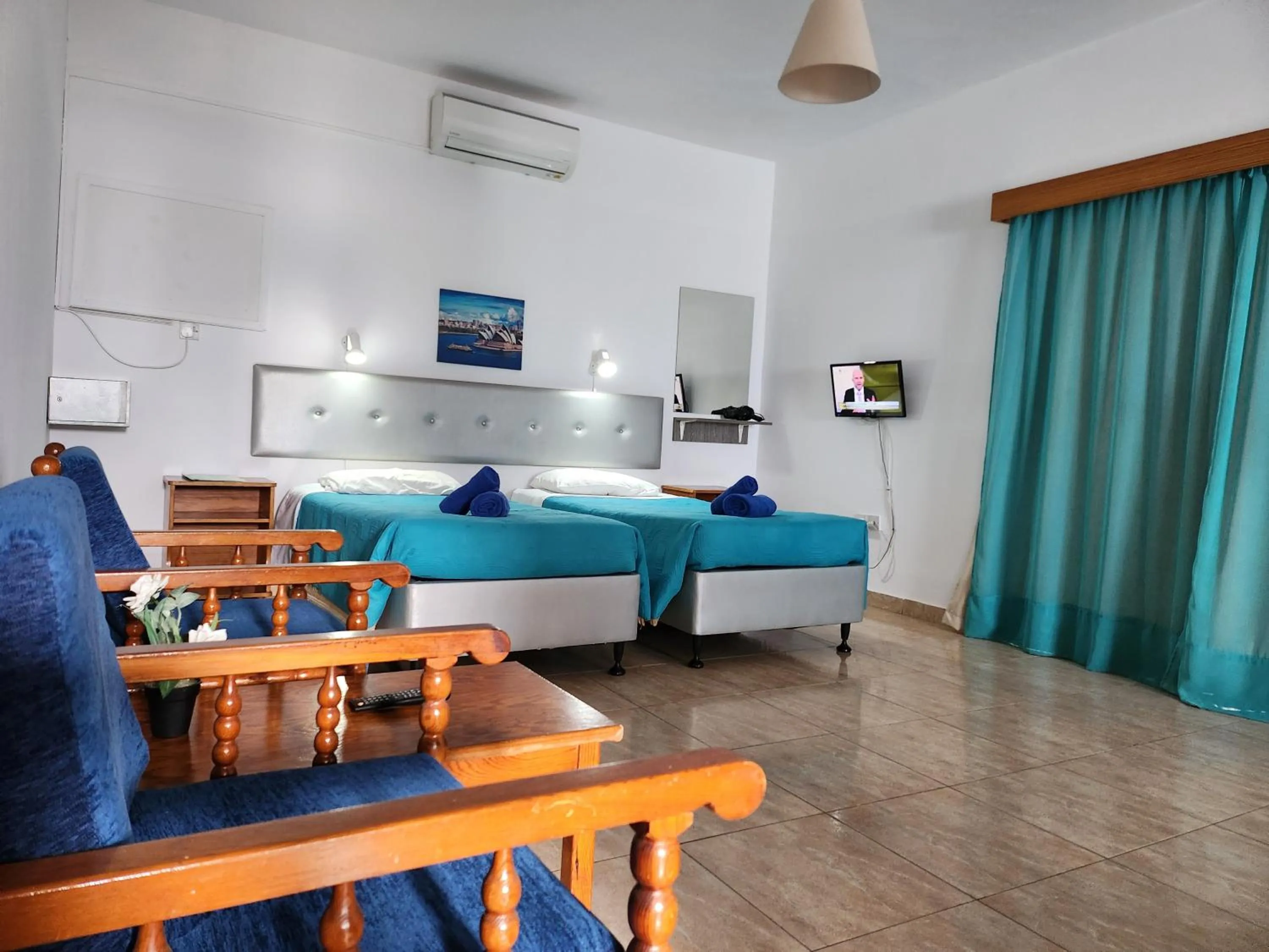 Bed in Florence Hotel Apartments