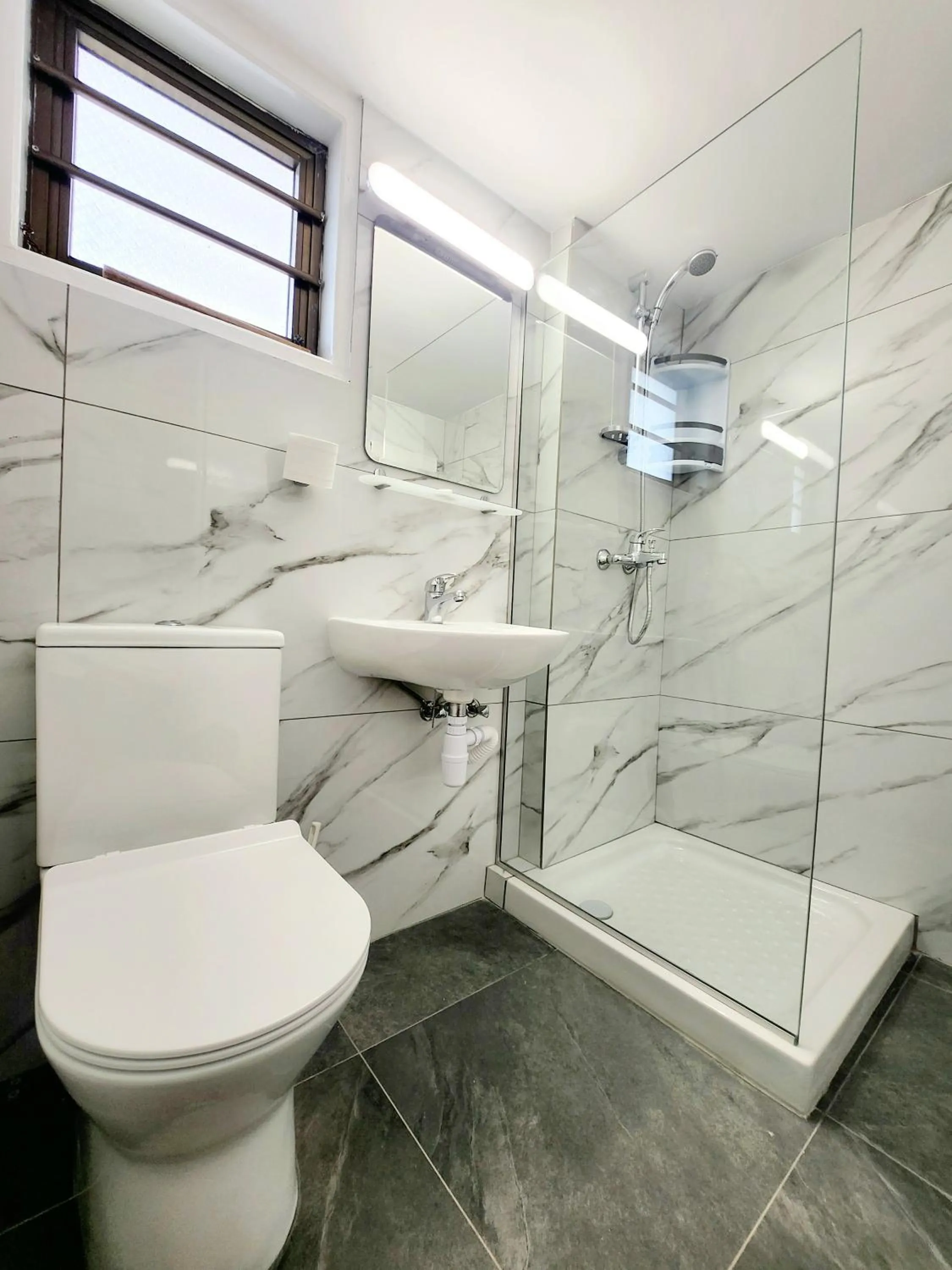 Shower in Florence Hotel Apartments