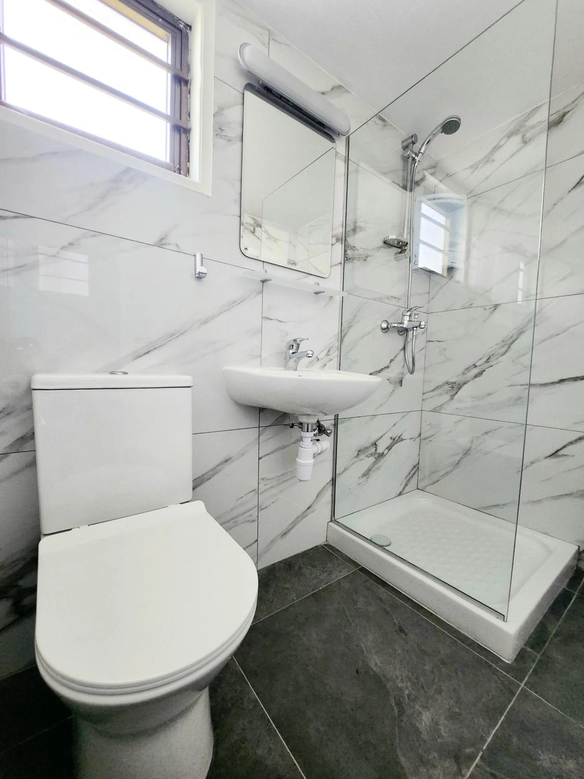 Shower in Florence Hotel Apartments