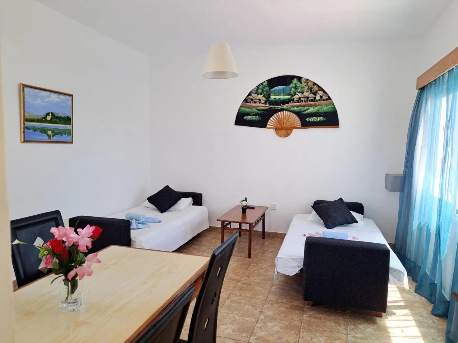 Living room, Bed in Florence Hotel Apartments