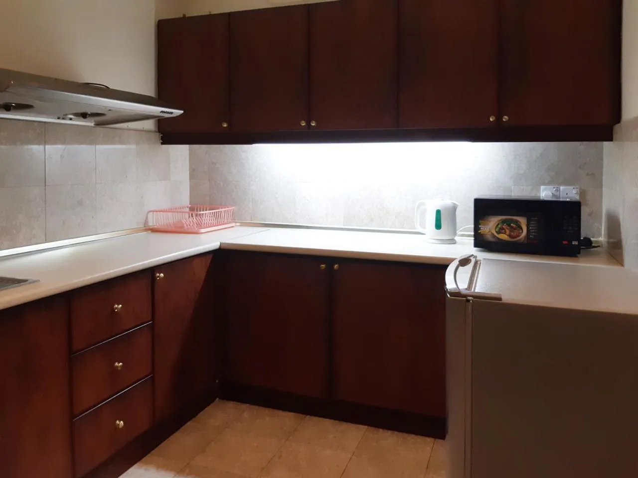 Kitchen or kitchenette in Comfort Service Apartment at Times Square KL