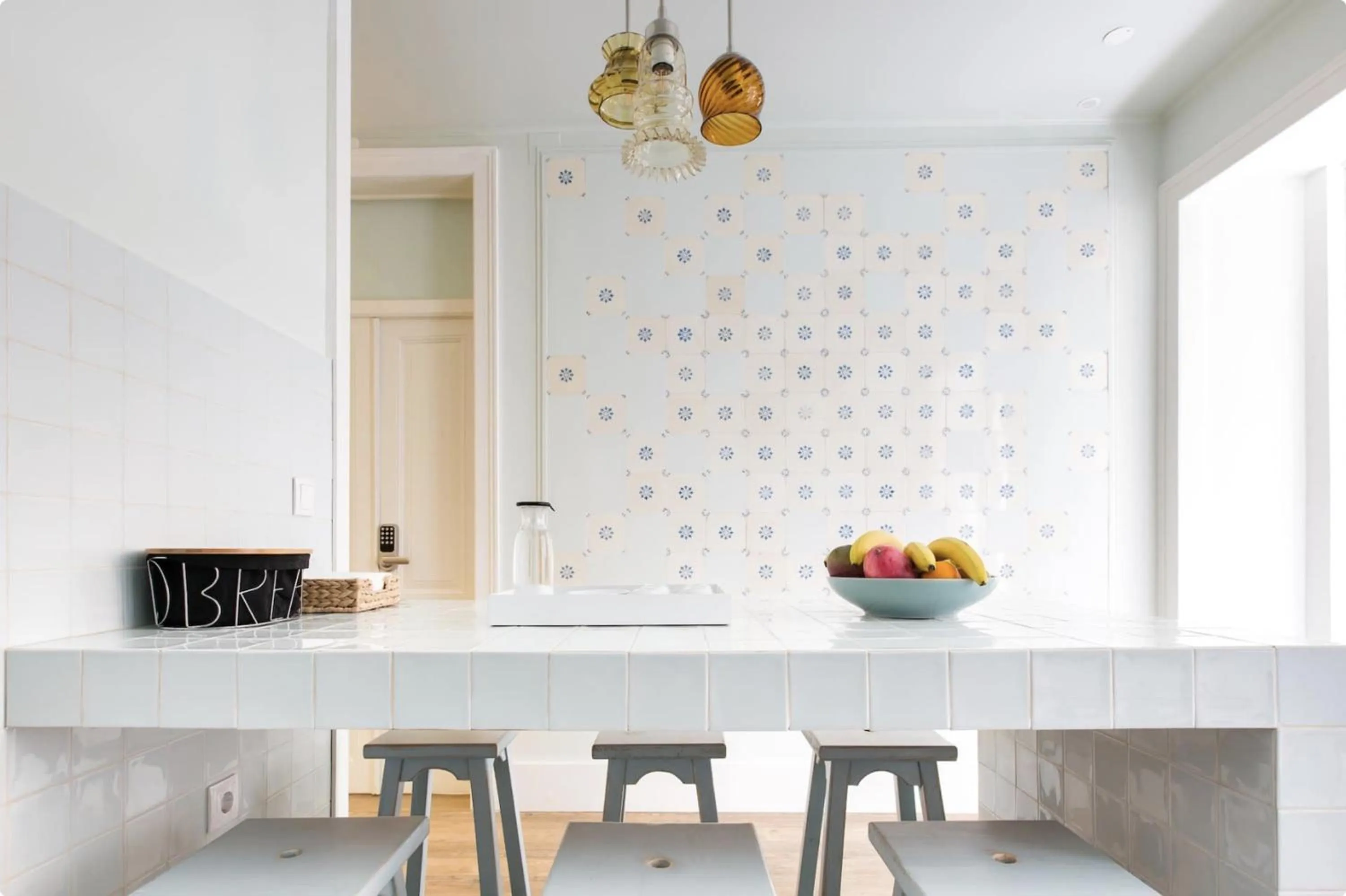 Communal kitchen in 1898 Home & Suites