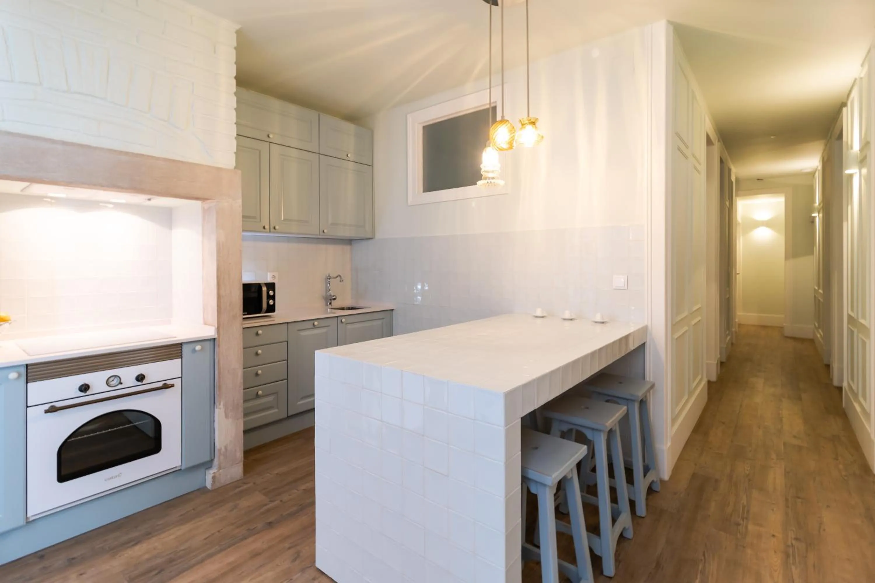 Kitchen or kitchenette in 1898 Home & Suites