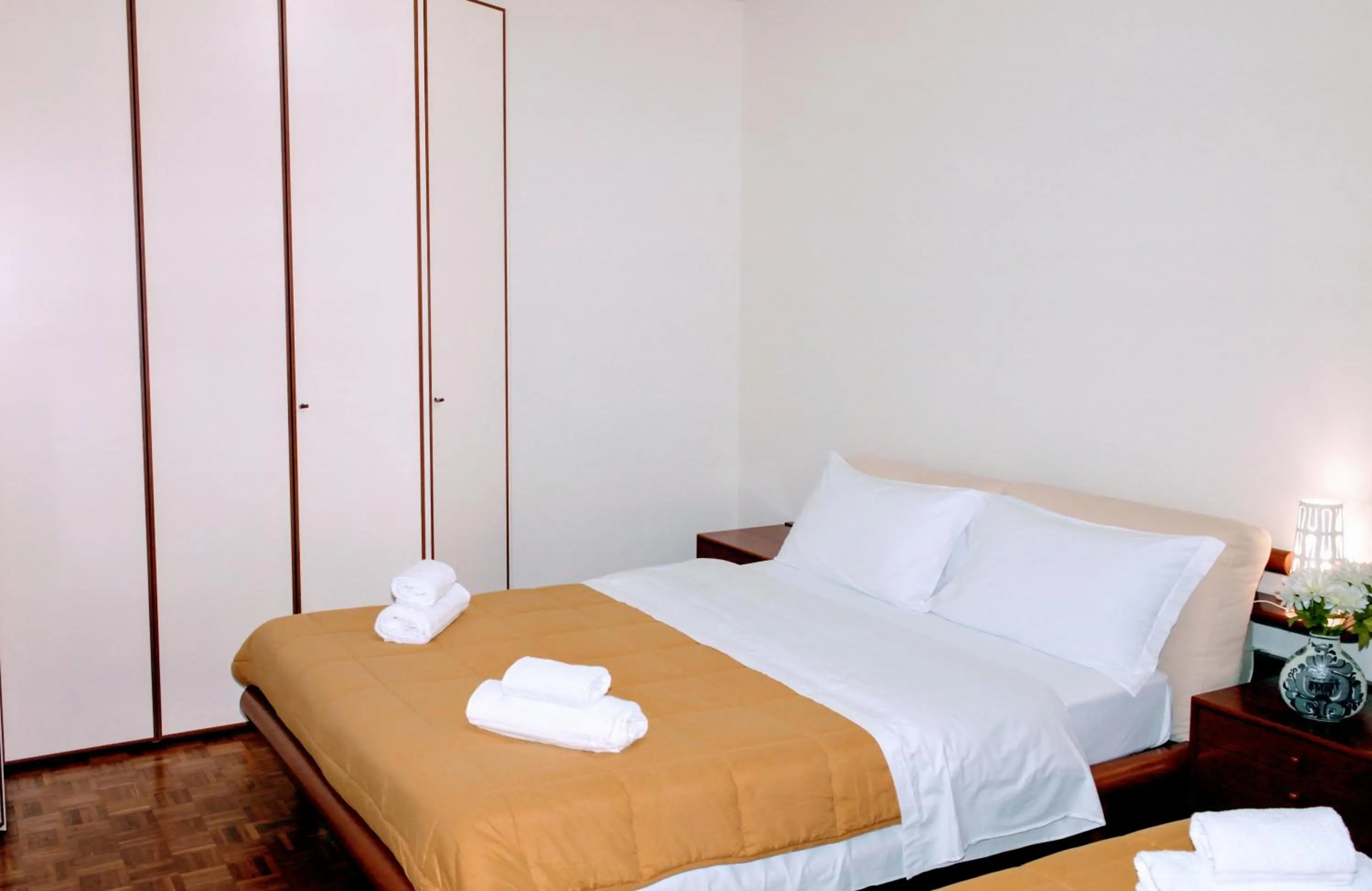 Bed in Rosa Garden B&B