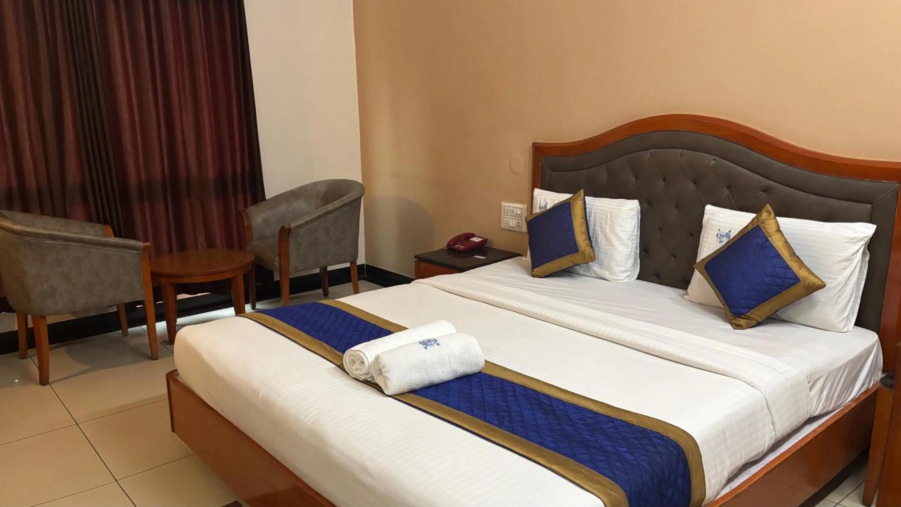 Bed in Hotel Chetan International