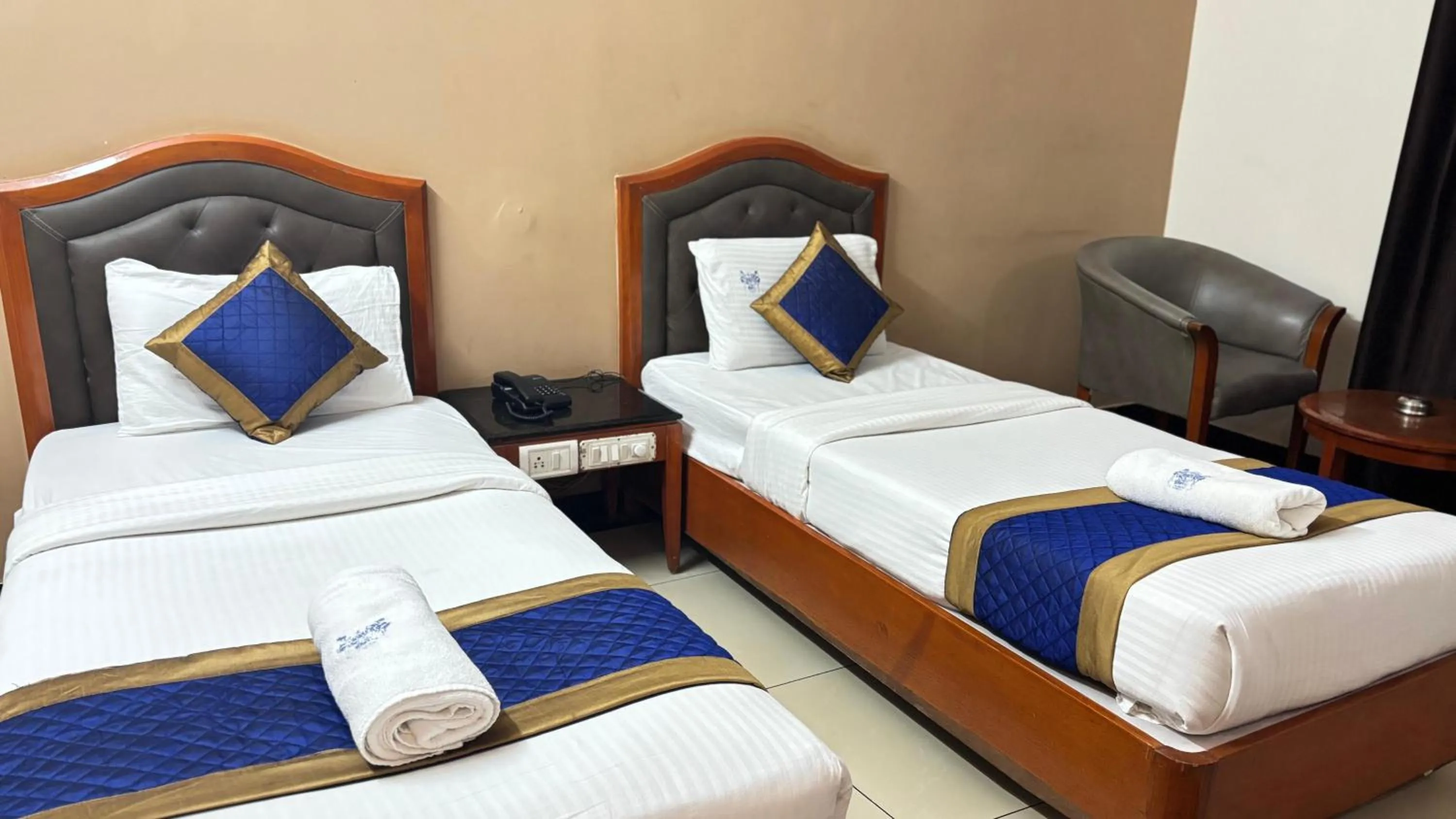 Bed in Hotel Chetan International
