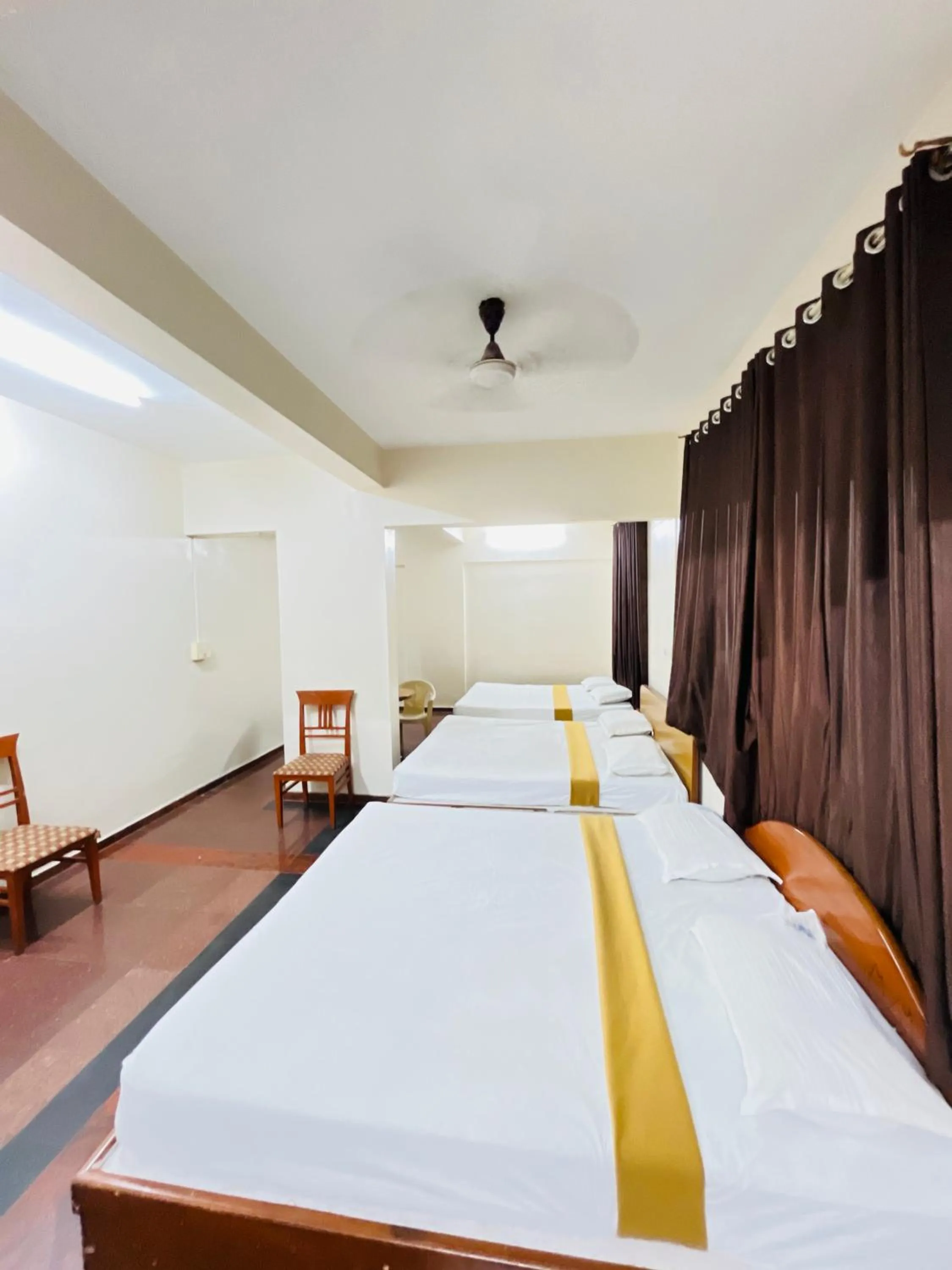 Bed in Hotel Chetan International