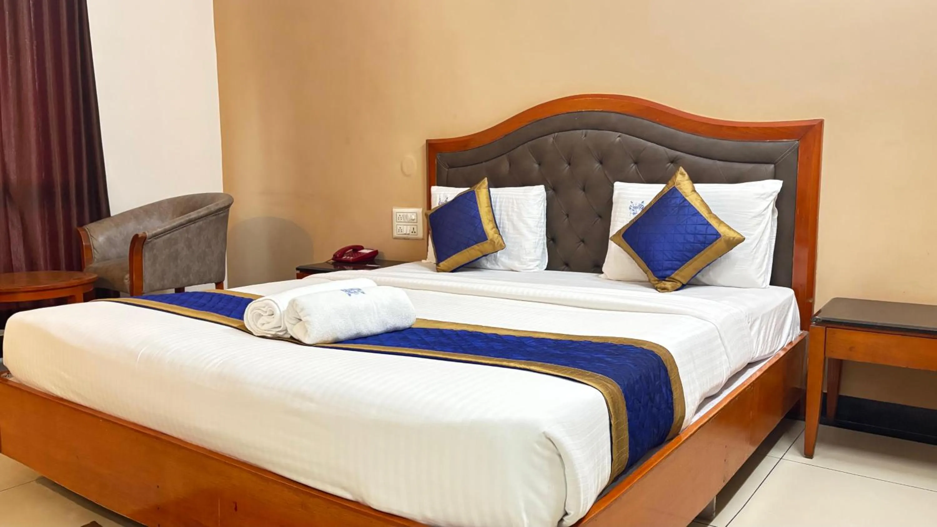 Bed in Hotel Chetan International