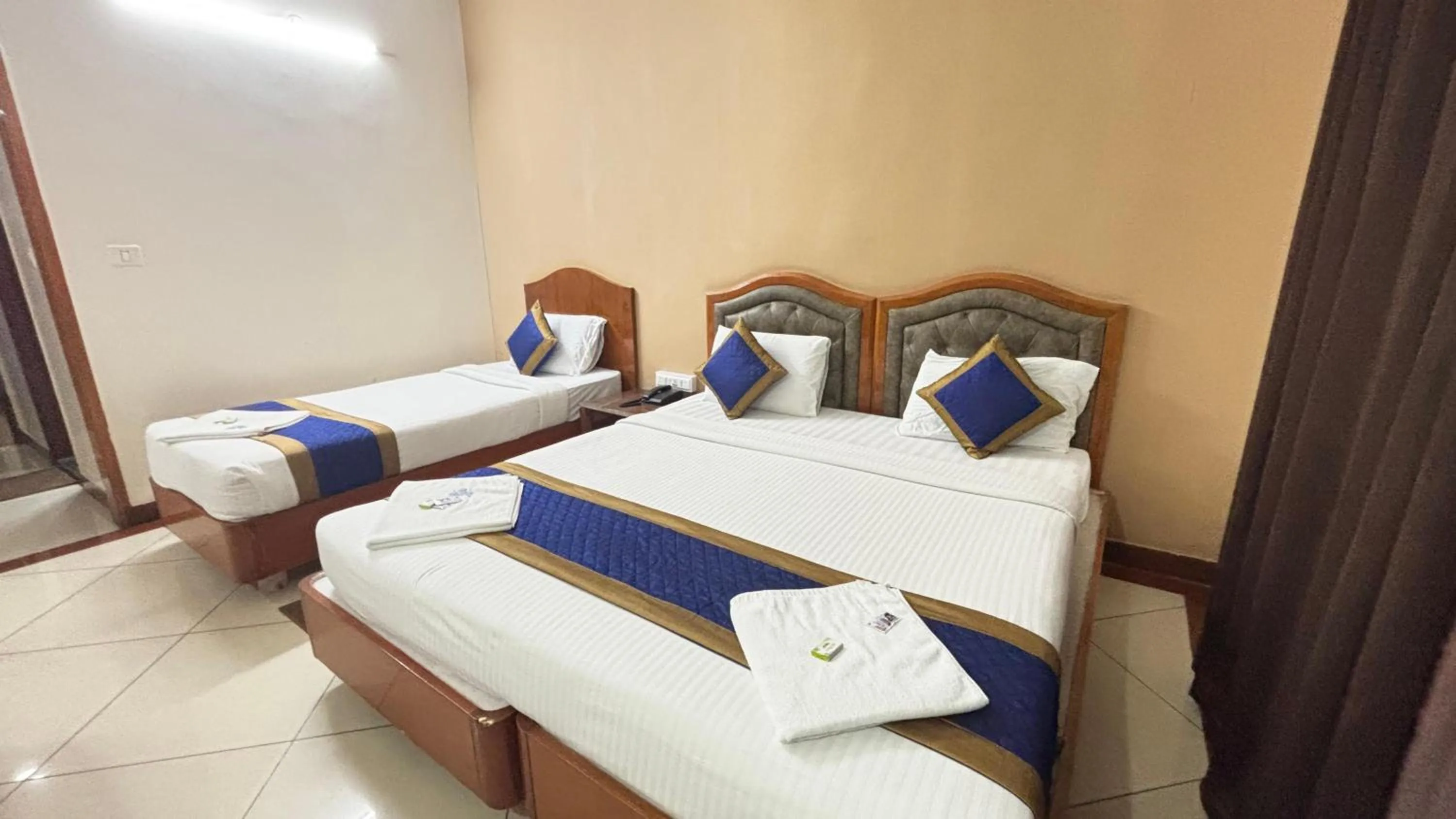 Bed in Hotel Chetan International